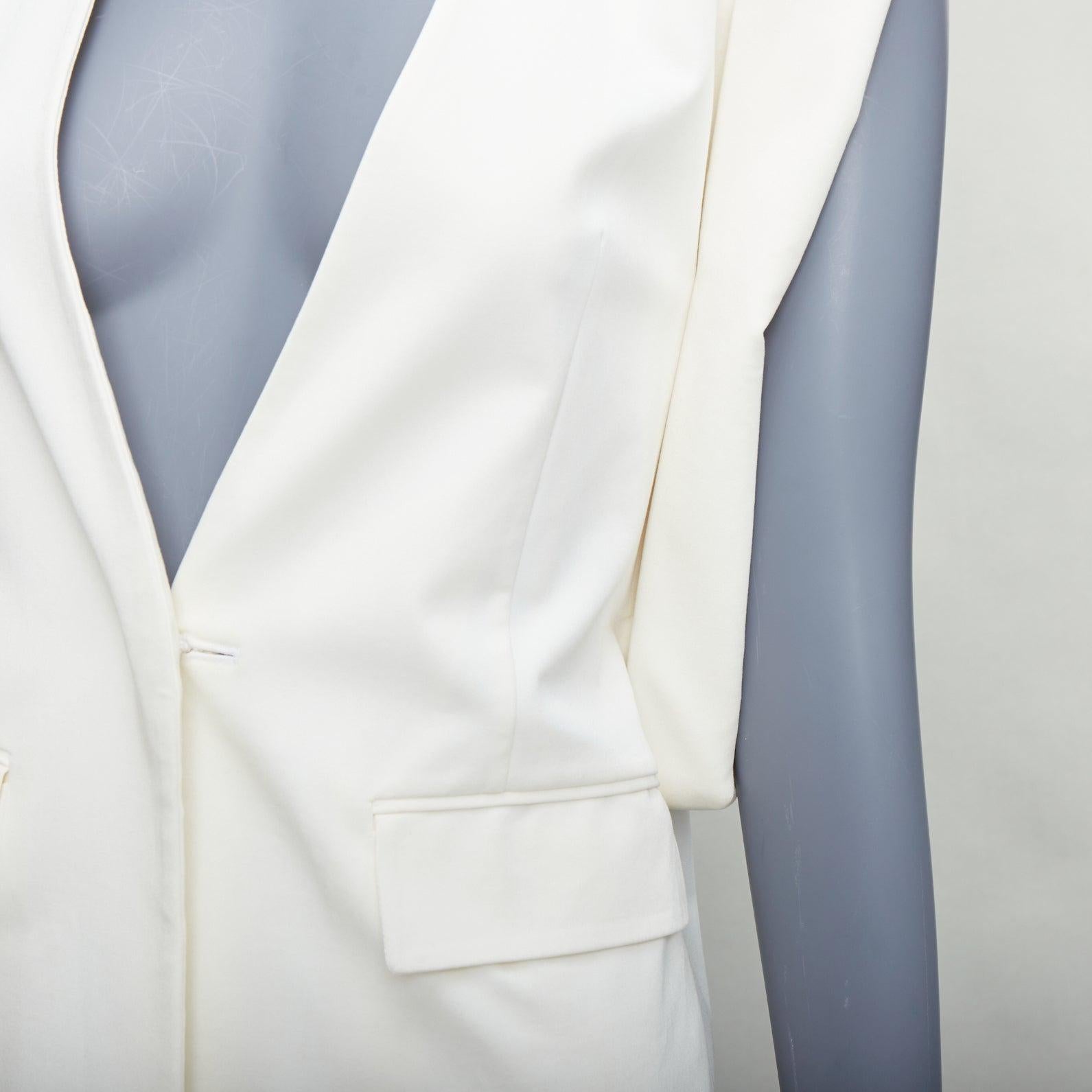 MAISON MARTIN MARGIELA 2011 cream silky padded deconstructed vest FR38 M
Reference: ALCU/A00003
Brand: Maison Margiela
Designer: Martin Margiela
Collection: SS 2011
Material: Viscose, Blend
Color: Cream
Pattern: Solid
Closure: Button
Lining: Cream