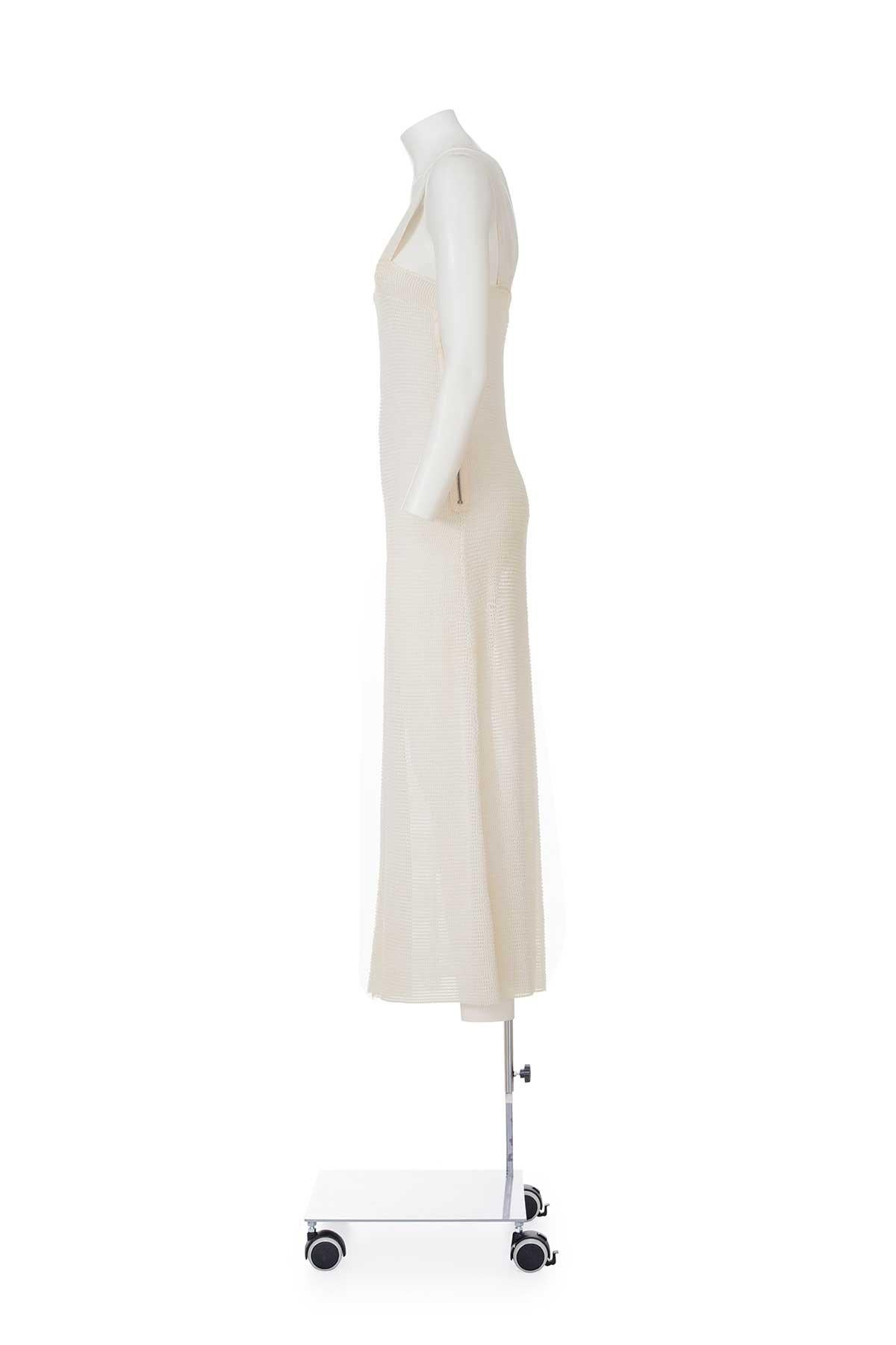 90's rare early collections' slip dress in waved fabric by Maison Martin Margiela.
Elasticated shoulder straps.
Side zipper.
The composition tag is missing, seems to be made of polyamide.