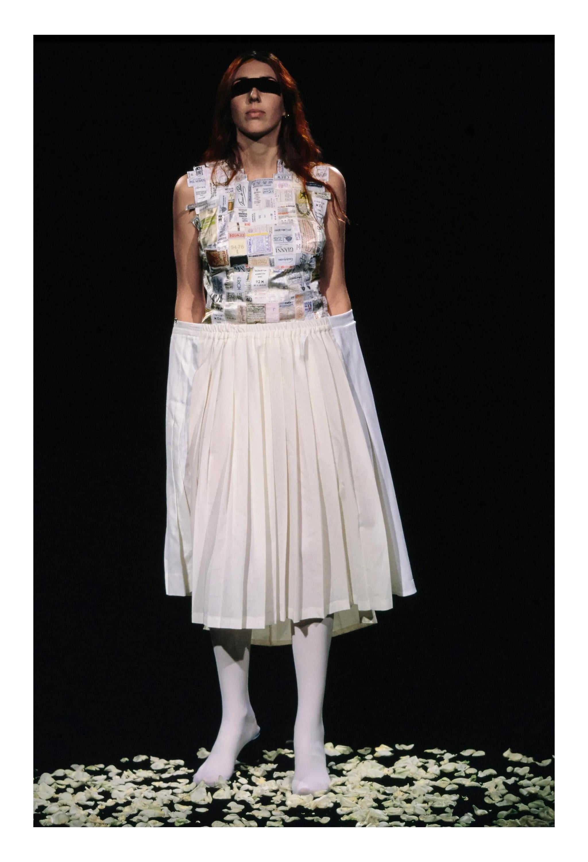 Resurrection Vintage is excited to offer a rare vintage Maison Martin Margiela off-white pleated oversized skirt from the spring 2001 collection, which focused on oversized tailoring, featuring fabric constructed from vintage pleated skirts, an
