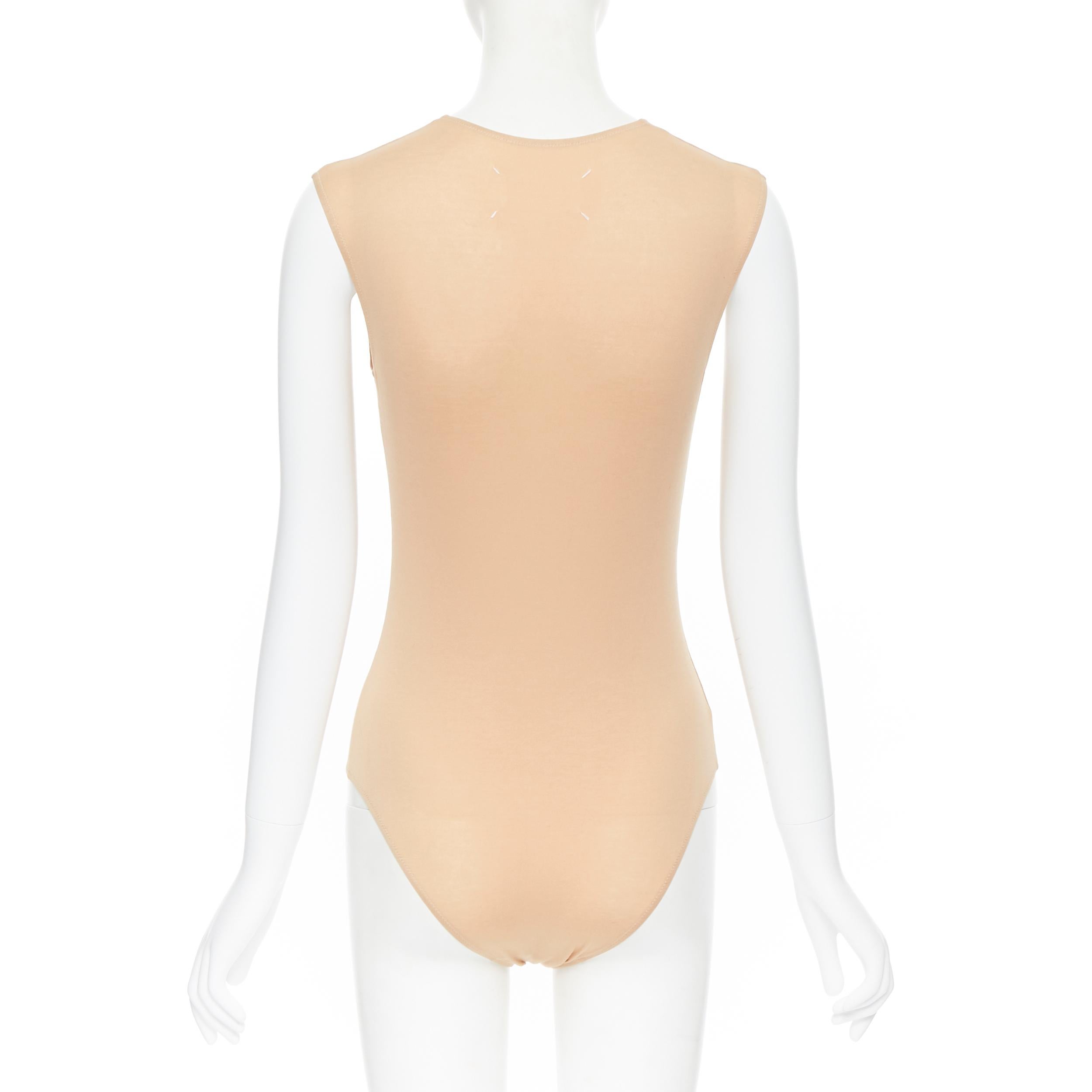 MAISON MARTIN MARGIELA beige nude sleeveless bodysuit bodice top IT42 
Reference: EACN/A00096 
Brand: Maison Margiela 
Material: Cotton 
Color: Beige 
Pattern: Solid 
Closure: Snap 
Extra Detail: Snap button at crotch. 
Made in: Italy