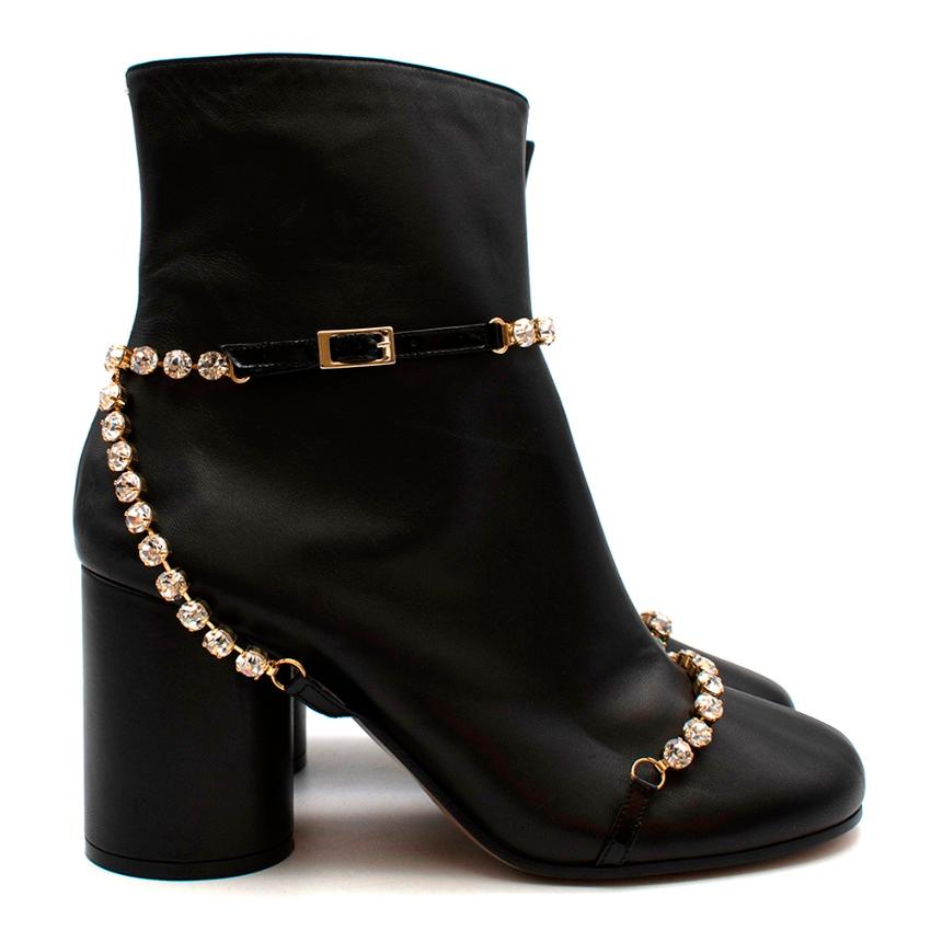 Maison Martin Margiela Black Leather Crystal Heeled Boots 

-Made os super soft leather 
-Gorgeous crystals details to the toes and ankles 
-Cylindrical chunky heels 
-Zip fastening to the sides 
-Luxurious soft leather lining for comfort
-Round