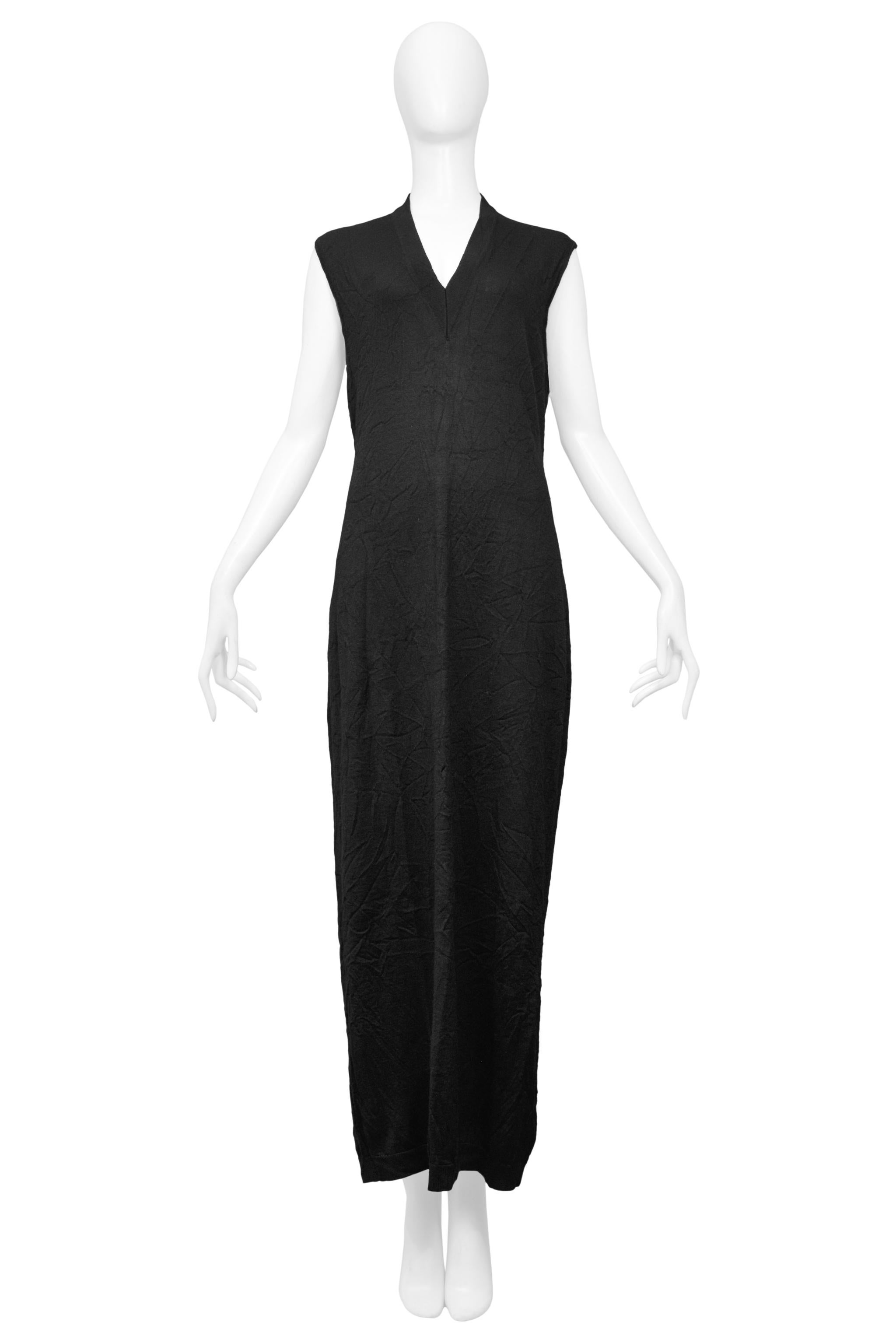 Resurrection Vintage is excited to offer a vintage Maison Martin Margiela black sleeveless maxi sweater dress featuring a v-neckline and crinkle appearance.

Maison Martin Margiela
Size: Medium 
Excellent Vintage Condition
Authenticity Guaranteed
