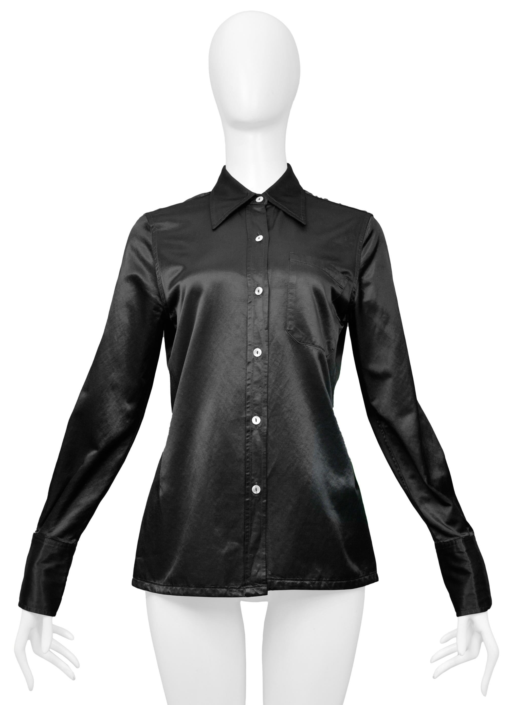 Resurrection Vintage is excited to offer a vintage Maison Martin Margiela black satin button-down shirt featuring long sleeves, contrasting buttons, one breast pocket, and a folder over collar.

Maison Martin Margiela
Size 42
Cotton and