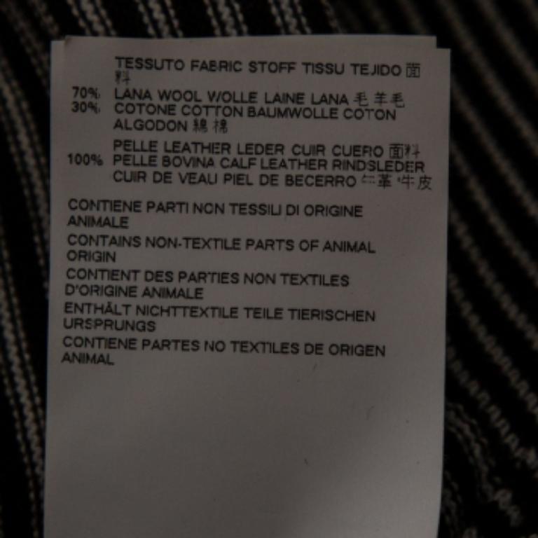 Uomo Maison Martin Margiela Maglia a righe nere in lana scamosciata con dettagli patch L.L.A. in vendita