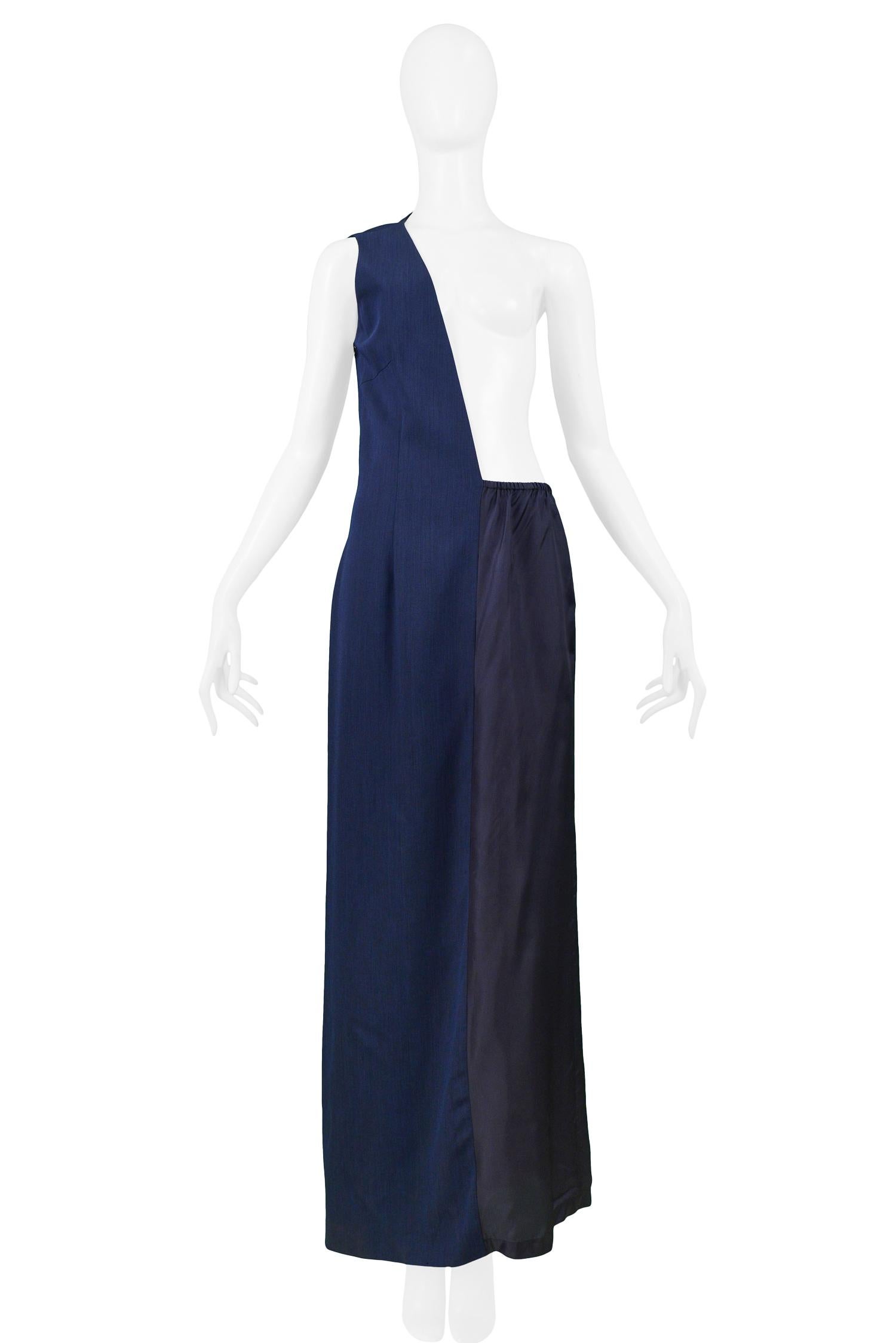 Resurrection Vintage is excited to offer a vintage Maison Martin Margiela two-tone blue wool deconstructed asymmetrical raw-edge dress with an attached skirt with an elastic waist.

Maison Martin Margiela
Size: 40
Wool
Excellent Vintage