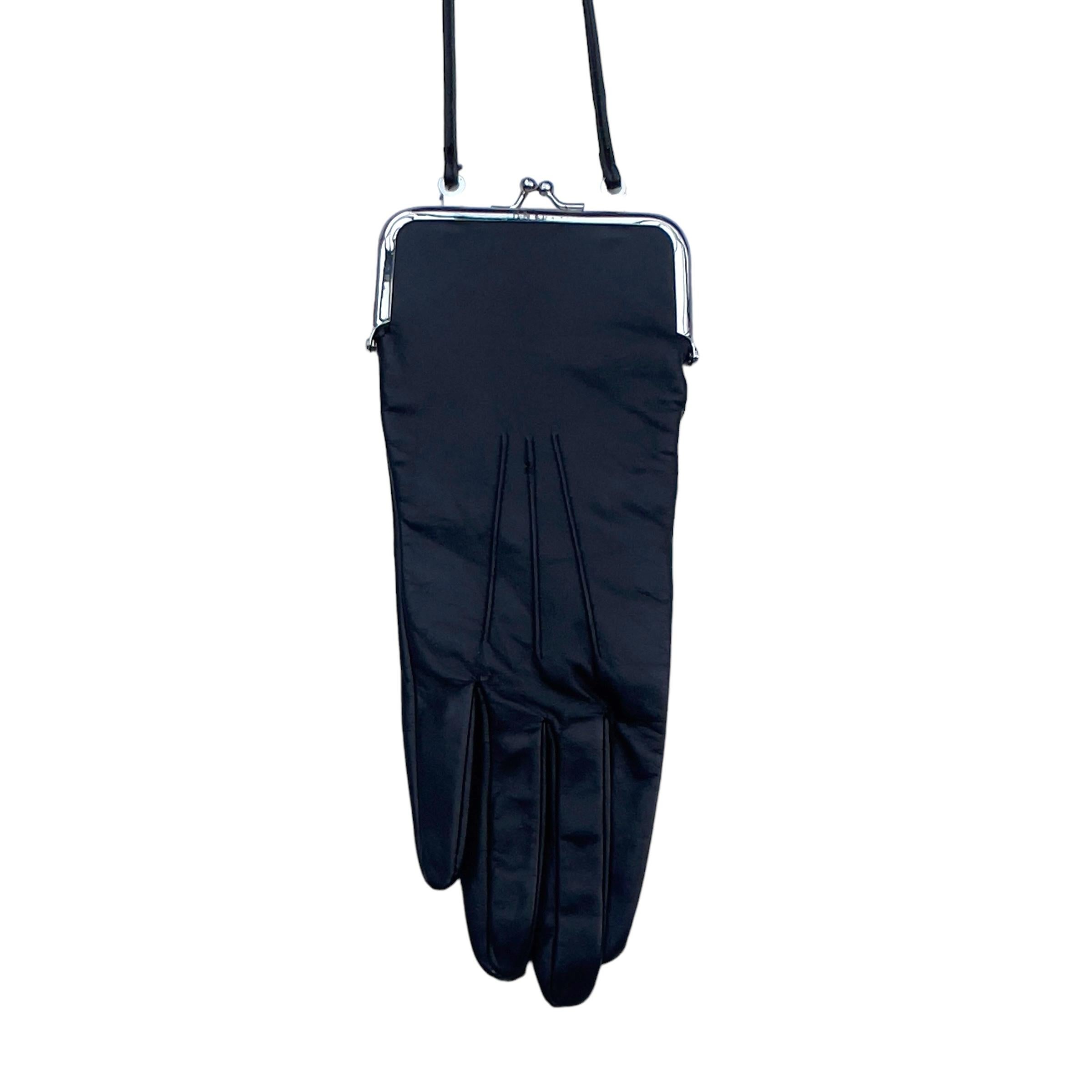 Maison Martin Margiela for H&M glove coin purse/bag in sleek black genuine leather. This piece is a limited edition from the 2012 collaboration between Maison Martin Margiela and H&M, although it was originally crafted in 1999 and re-edited for this