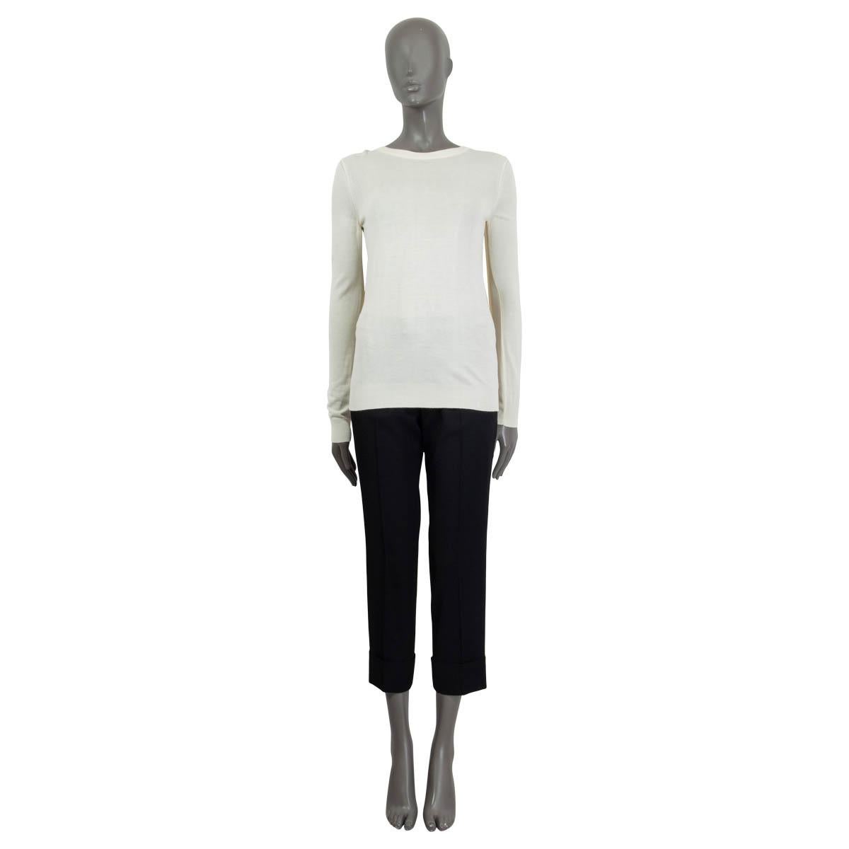 100% authentic Maison Margiela long sleeve knit sweater in ivory viscose (100%). Features a paneled cape at the back. Unlined. Has been worn and is in excellent condition.

Measurements
Tag Size	S
Size	S
Shoulder Width	38cm (14.8in)
Bust	84cm