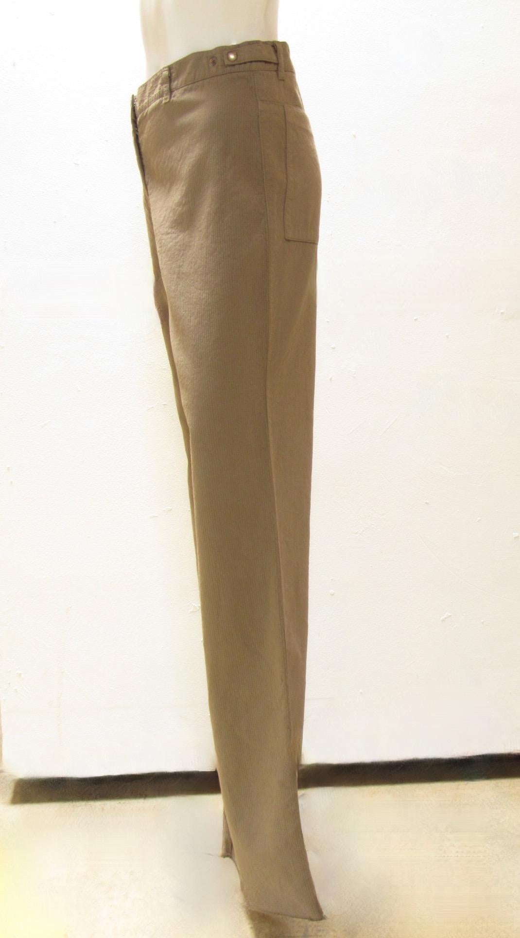 Low cut textured khaki pant from Maison Martin Margiela come with ample pockets in front and back, have wide legs. 