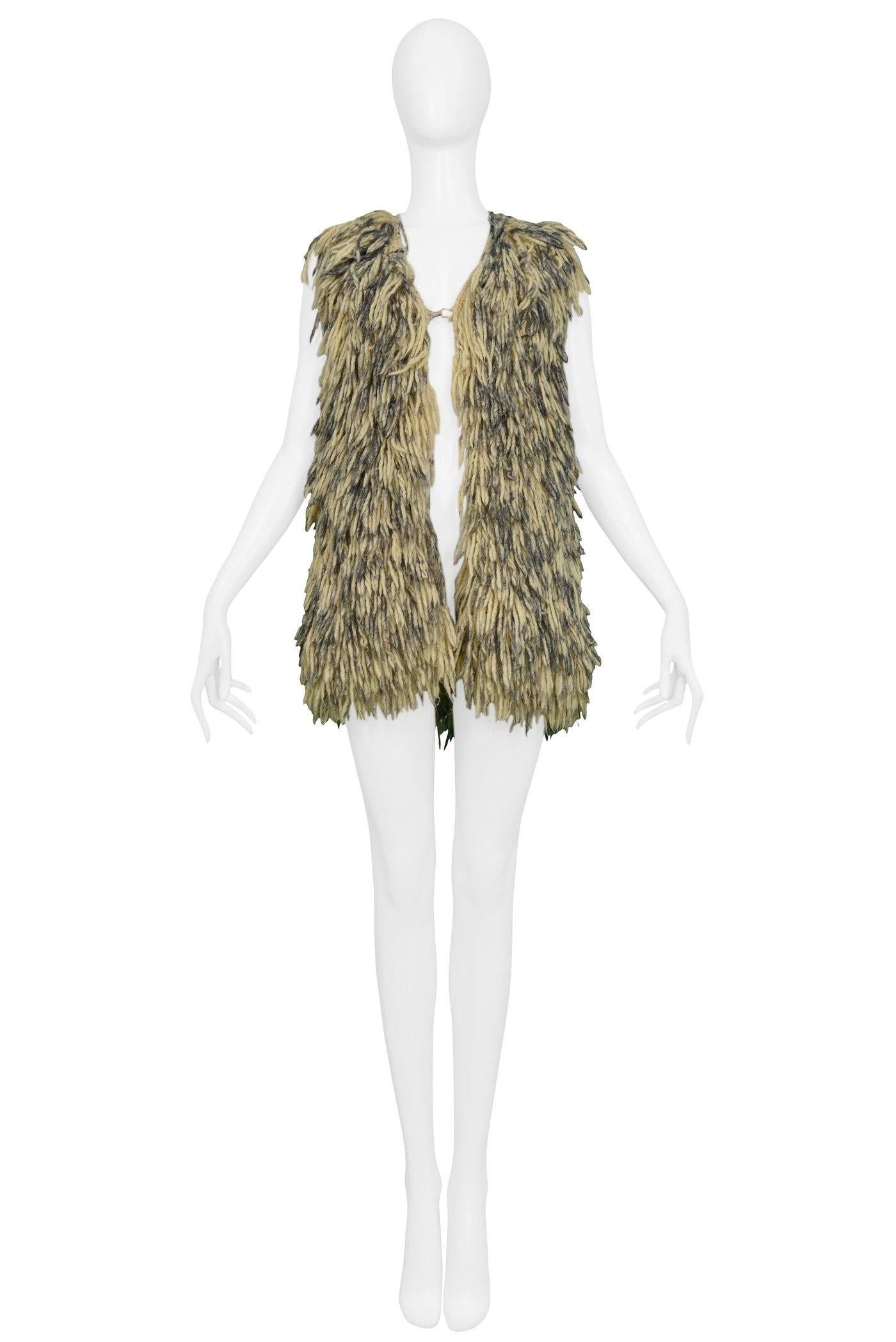Resurrection Vintage is excited to offer a vintage Maison Martin Margiela off-white knit shag gilet with two-tone grey tip yarn, and hook and eye closure. 

Maison Martin Margiela
Size: One Size
Knit - Feel Like Wool
Excellent Vintage
