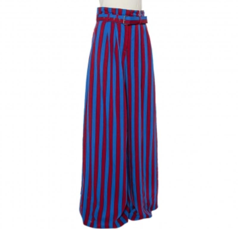 These palazzo pants from Maison Martin Margiela deserve a place in your wardrobe. Covered in stripes of red and blue, the pair is secured with a front zip closure and enhanced with a matching belt.