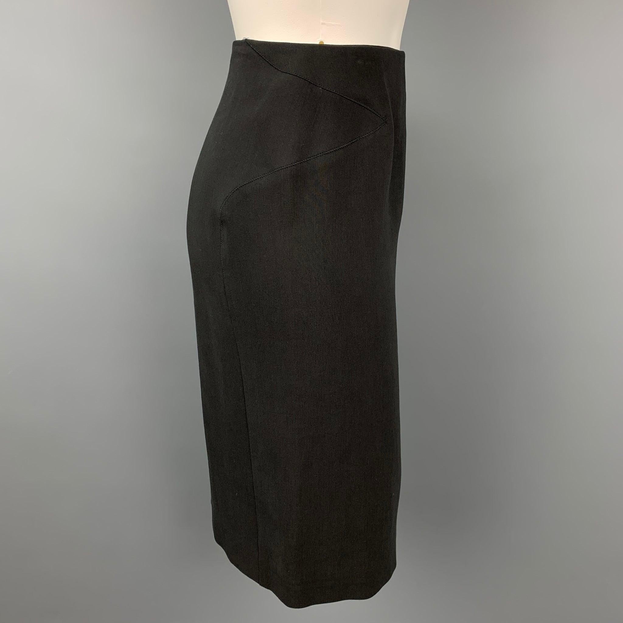 MAISON MARTIN MARGIELA skirt comes in a black cotton / silk featuring a pencil style, top stitching, and a back zipper closure. Made in Italy.New With Tags.
 

Marked:   IT 40 

Measurements: 
  Waist:
28 inches  Hip:
36 inches  Length: 23.5 inches