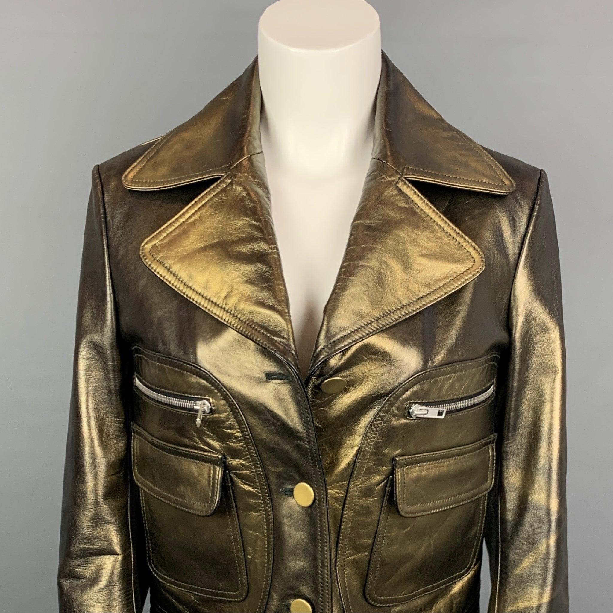 MAISON MARTIN MARGIELA jacket comes in a olive & gold leather with a full liner featuring a notch lapel style, large zipper & flap pockets, and a buttoned closure. Made in Italy.Excellent
Pre-Owned Condition. 

Marked:   40 

Measurements: 
