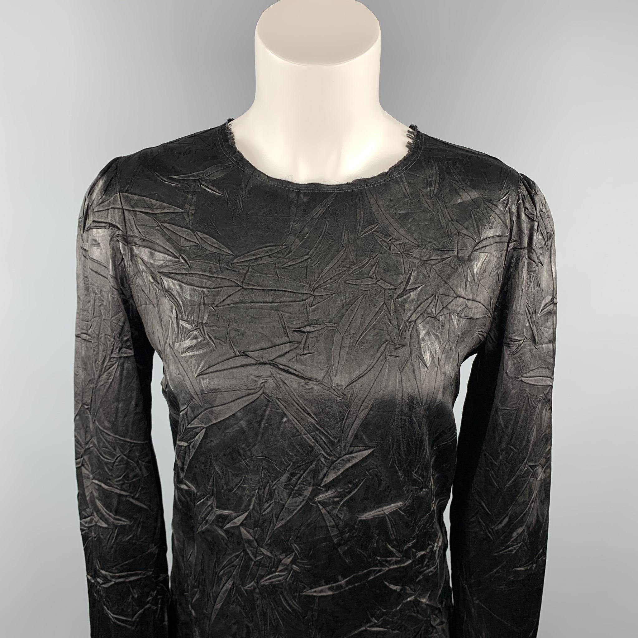 MAISON MARTIN MARGIELA blouse comes in a black acetate / viscose with a wrinkled design throughout featuring a raw hem neckline and a back zipper closure. Made in Italy.

Excellent Pre-Owned Condition.
Marked: IT 42

Measurements:

Shoulder: 15 in.