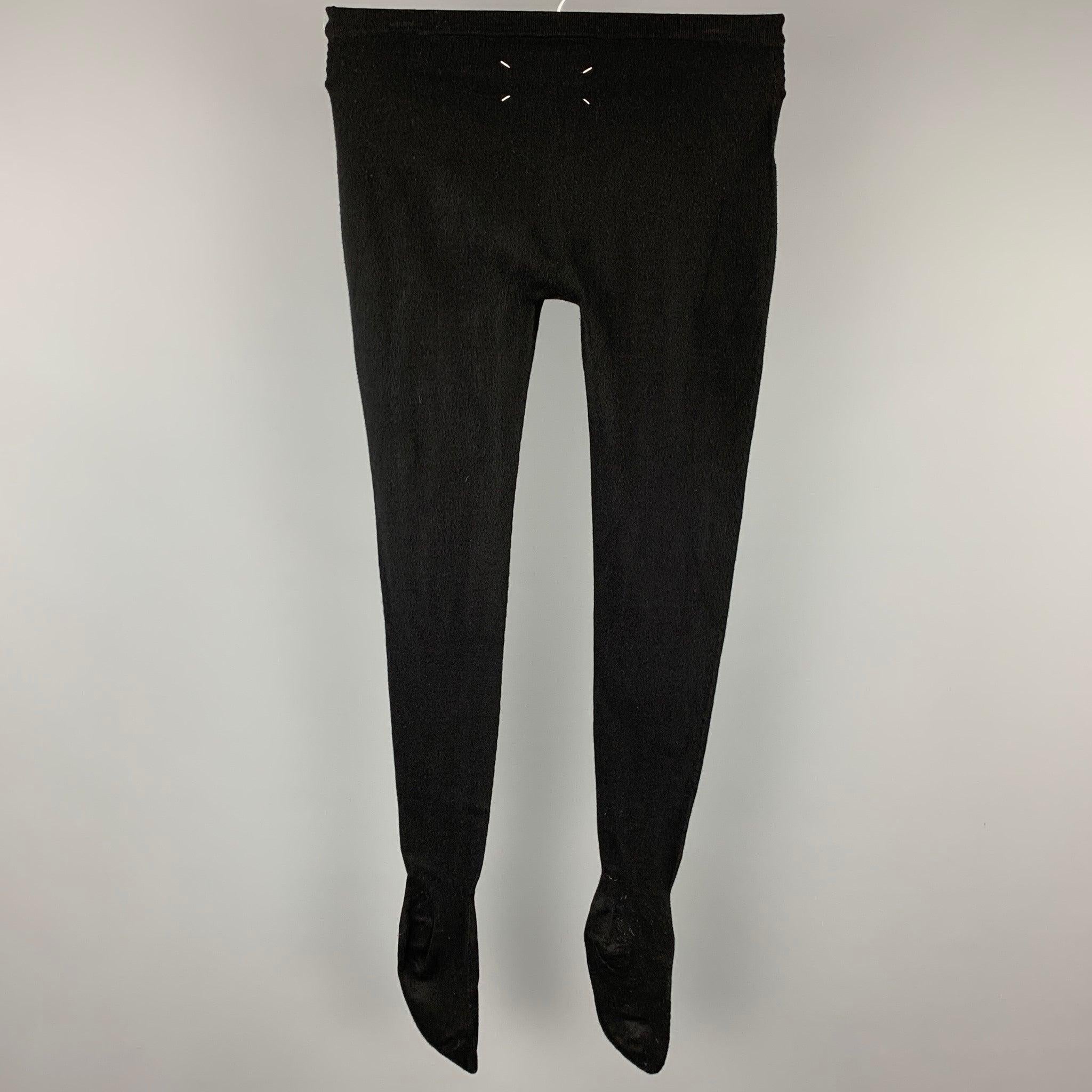 MAISON MARTIN MARGIELA leggings comes in a black viscose / polyester and features a feet design. Made in Italy.
Very Good
Pre-Owned Condition. 

Marked:   M 

Measurements: 
  Waist: 24 inches  Inseam: 36 inches  / Measured with feet.
  
  
