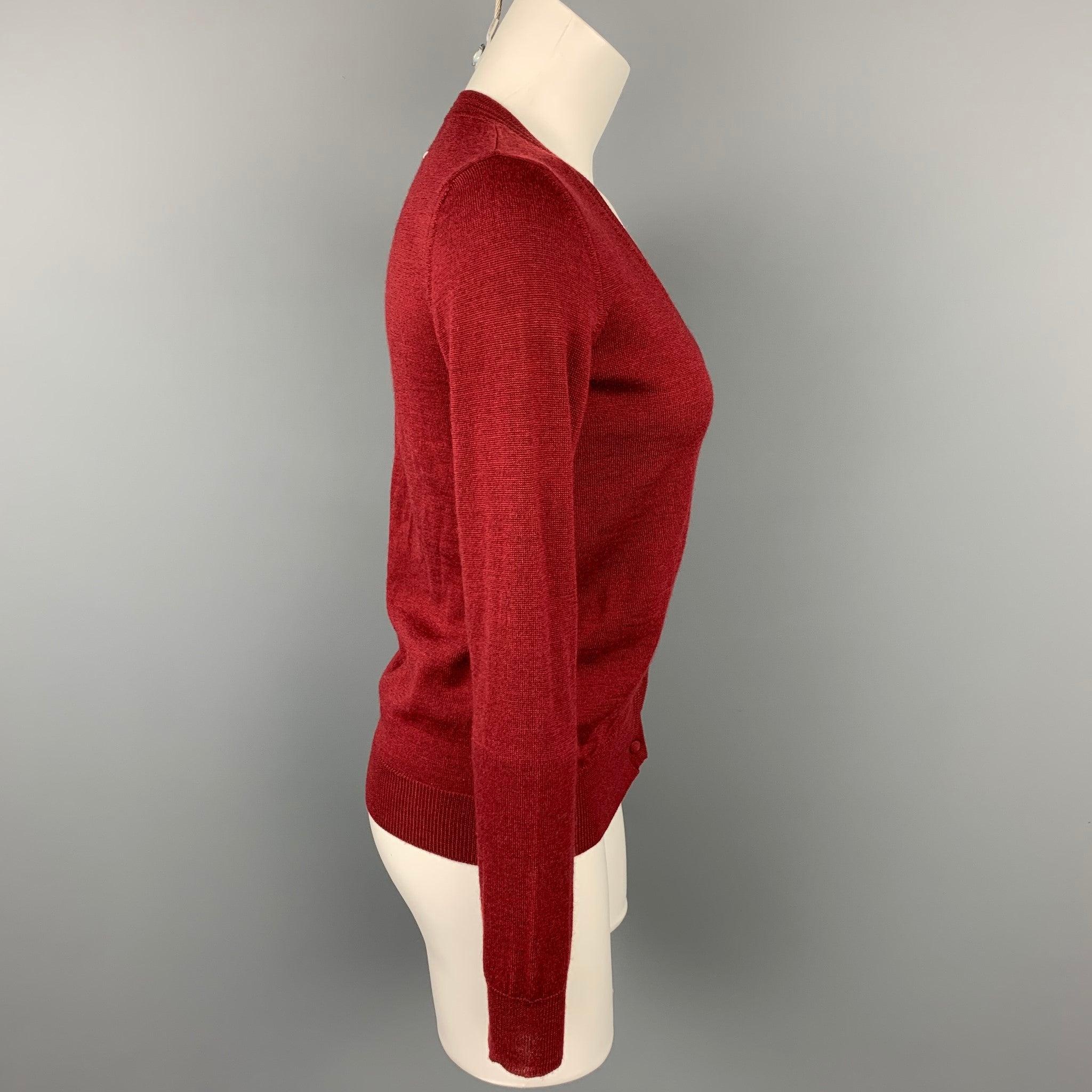 MAISON MARTIN MARGIELA cardigan comes in a burgundy wool featuring a covered button closure. Made in Italy.Very Good
Pre-Owned Condition. 

Marked:   S 

Measurements: 
 
Shoulder: 15 inches  Bust: 34 inches  Sleeve: 26 inches  Length: 23.5 inches 
