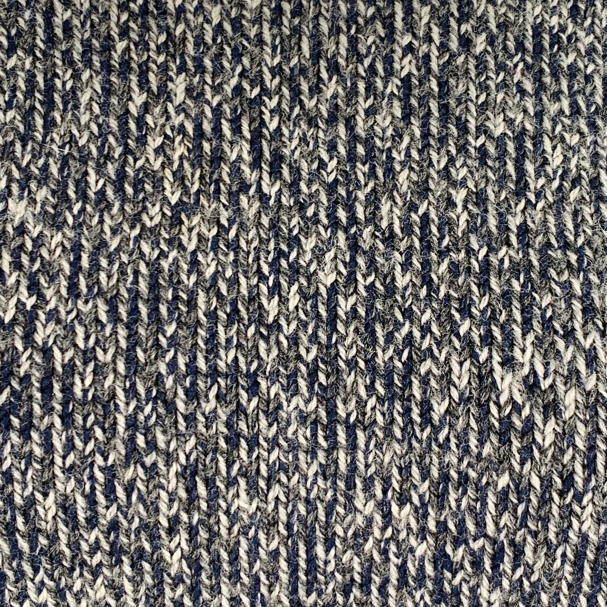 MAISON MARTIN MARGIELA sweater
in a grey, charcoal grey, and blue wool blend knit featuring long blouson sleeves, signature MARGIELA stitch details, and crew neck. Made in Italy.Very Good Pre-Owned Condition. Minor pilling. 

Marked:   S