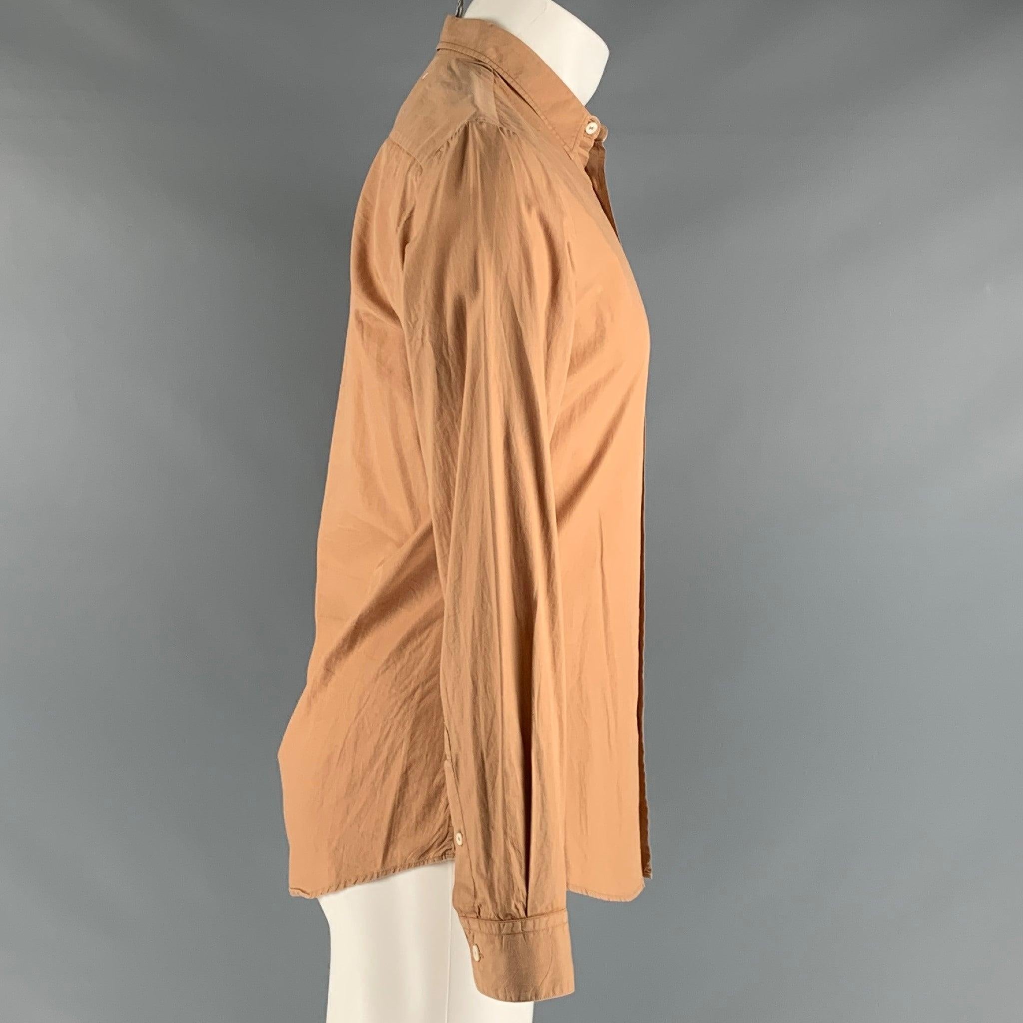 MAISON MARTIN MARGIELA long sleeve shirt comes in an orange cotton woven material featuring a straight collar, and a button up closure. Very Good Pre-Owned Condition. 

Marked:   10- 44 

Measurements: 
 
Shoulder: 17 inches Chest: 41 inches 