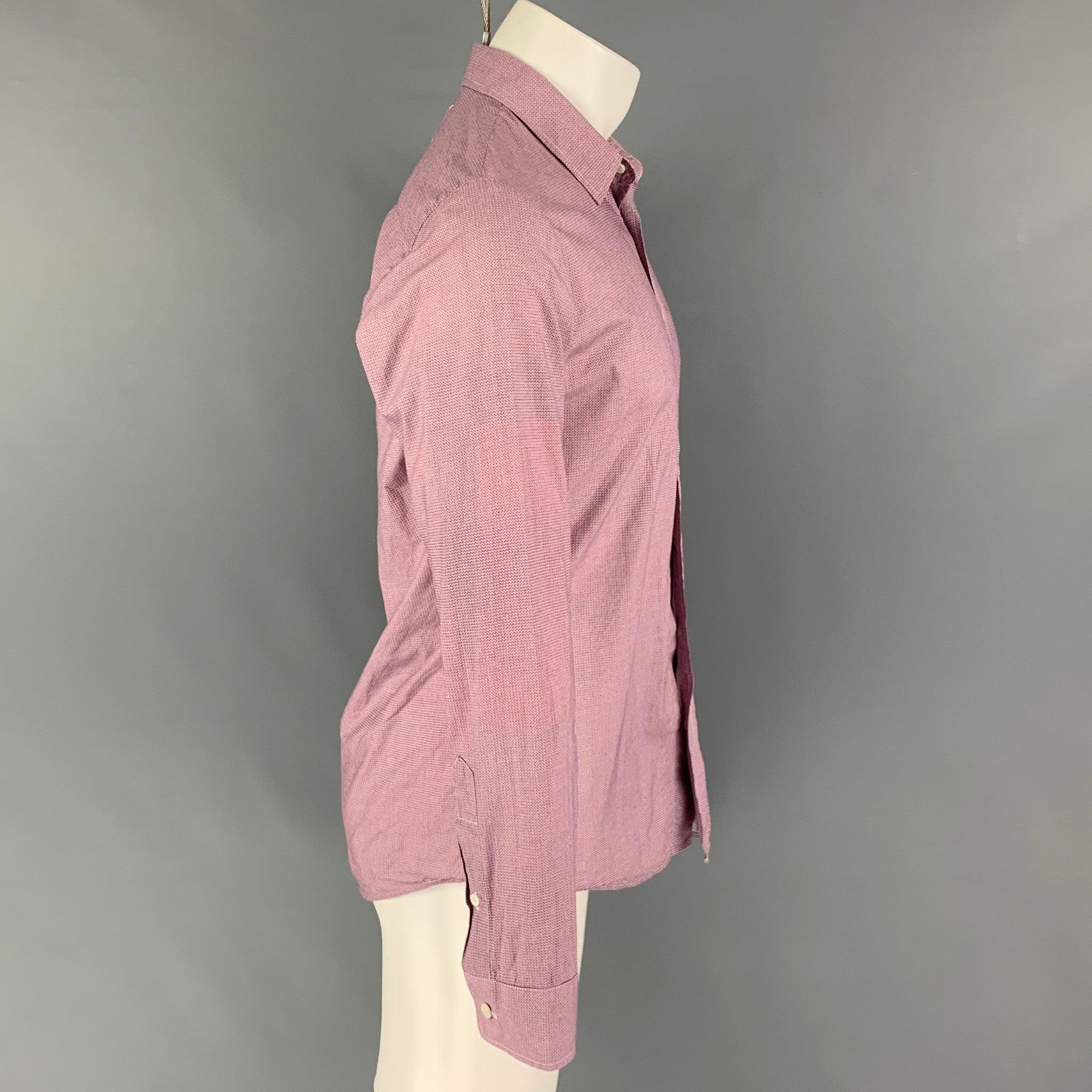 MAISON MARTIN MARGIELA long sleeve shirt comes in a red & white dot print cotton featuring a spread collar and a button up closure. Made in Romania.Very Good
 Pre-Owned Condition. 
 

 Marked:  46 
 

 Measurements: 
  
 Shoulder: 16.5 inches Chest: