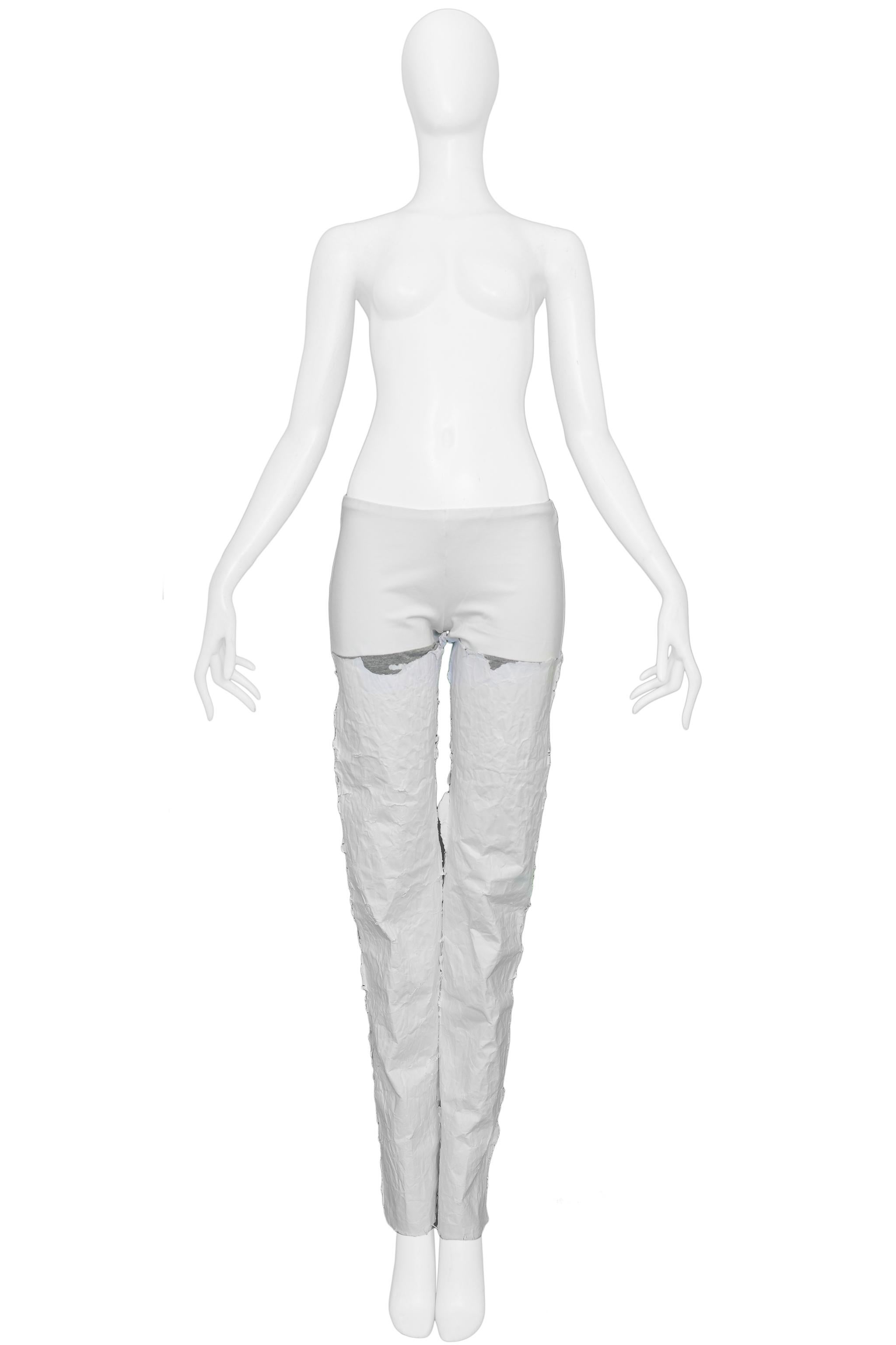 Resurrection Vintage is excited to offer a vintage Maison Martin Margiela white paper pants featuring a spandex top and painted paper legs.

Maison Martin Margiela
Size 40
Stretch Knit and Paper
Excellent Vintage Condition
Authenticity guaranteed