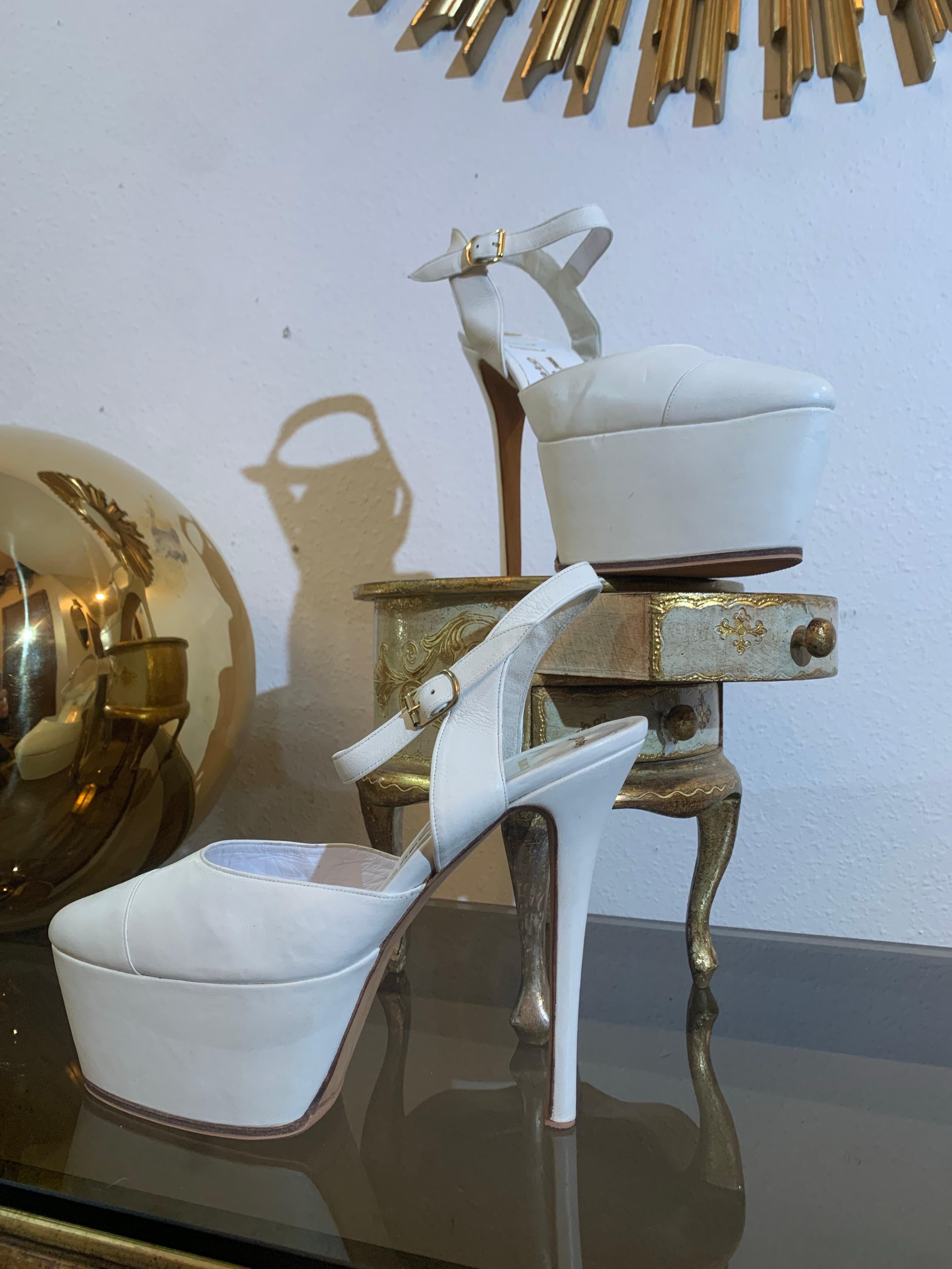 Maison Massaro - Paris Custom-Made Pure White Leather Platform Shoes:  Bespoke kid leather in a pure white glove leather with a 2 inch platform at front rising to a 5 inch stiletto heel. Almond-shaped toe box with thin ankle straps. New-never worn.