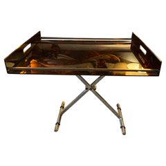Maison Mercier Paris folding table in tortoise shell lucite and brass, 1970