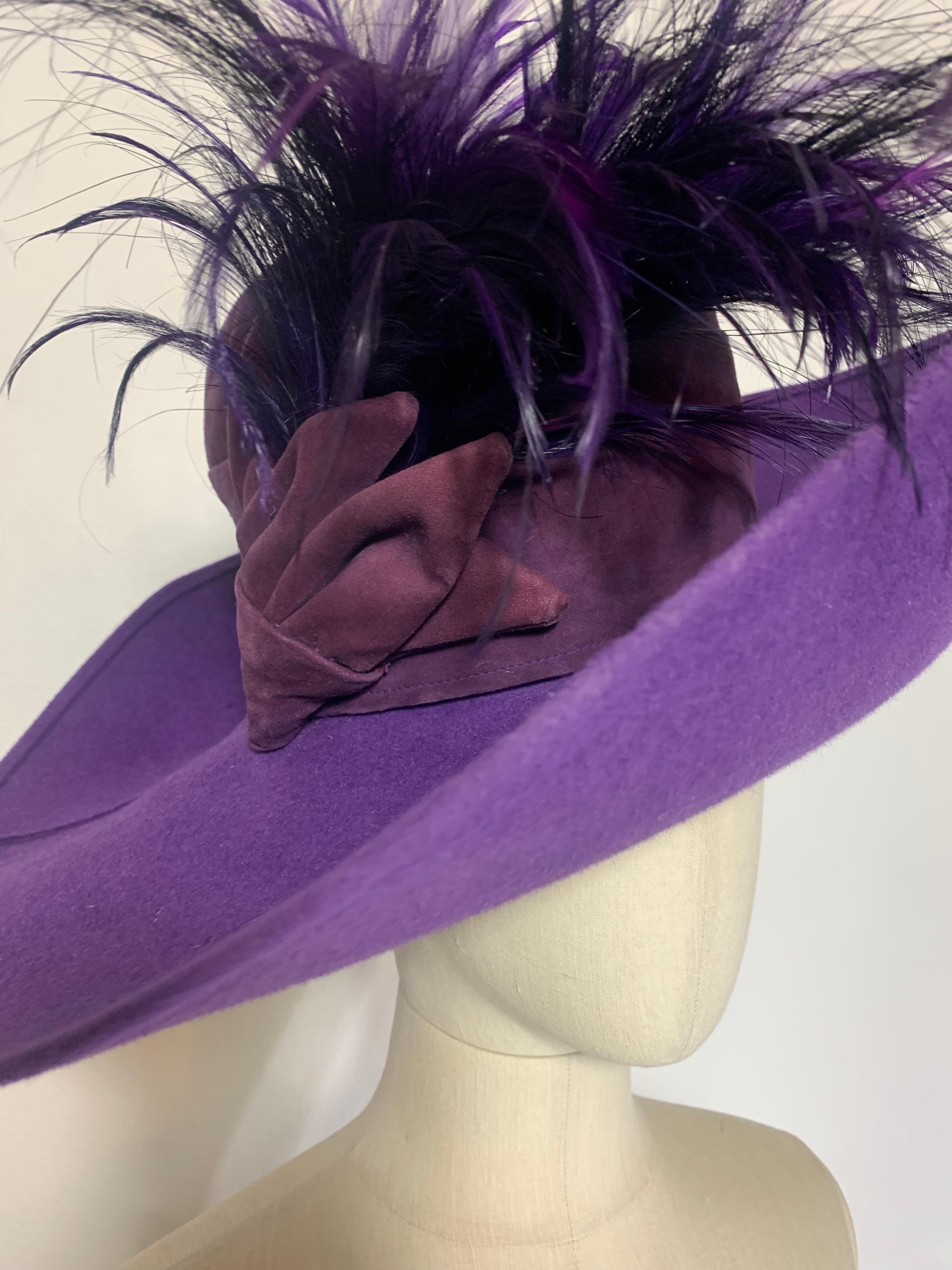 Maison Michel Autumn/Winter Purple Felt Wide Brim Hat w Suede Crown & Feathers:  Turned up brim with unusual suede rounded crown and purple dyed feather flourish at side. Brim measures 20