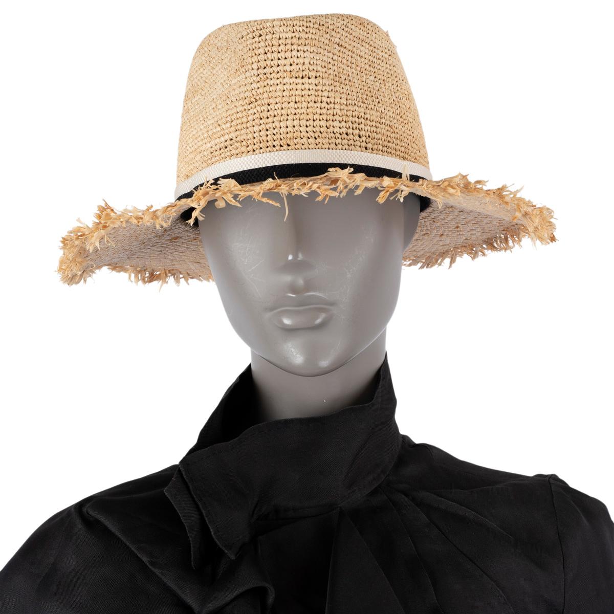 100% authentic Maison Michel fringe wide brim straw hat in beige raffia with a black & white band. Has been worn and is in virtually new condition.

Measurements
Tag Size	L
Inside Circumference	58cm (22.6in)

All our listings include only the listed