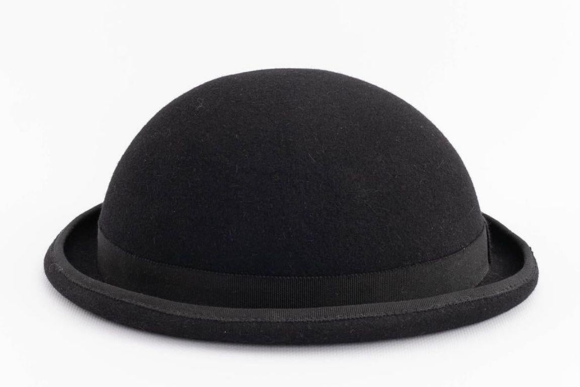 Maison Michel - Black felt bowler hat.

Additional information: 
Dimensions: Circumference: 54 cm (21.25