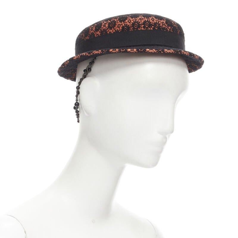 MAISON MICHEL black floral lace orange felt black pearl chain fedora hat 52cm
Reference: MELK/A00156
Brand: Maison Michel
Material: Wool
Color: Orange, Black
Pattern: Floral
Extra Details: Black floral lace embroidery covered wool felt. Grosgrain