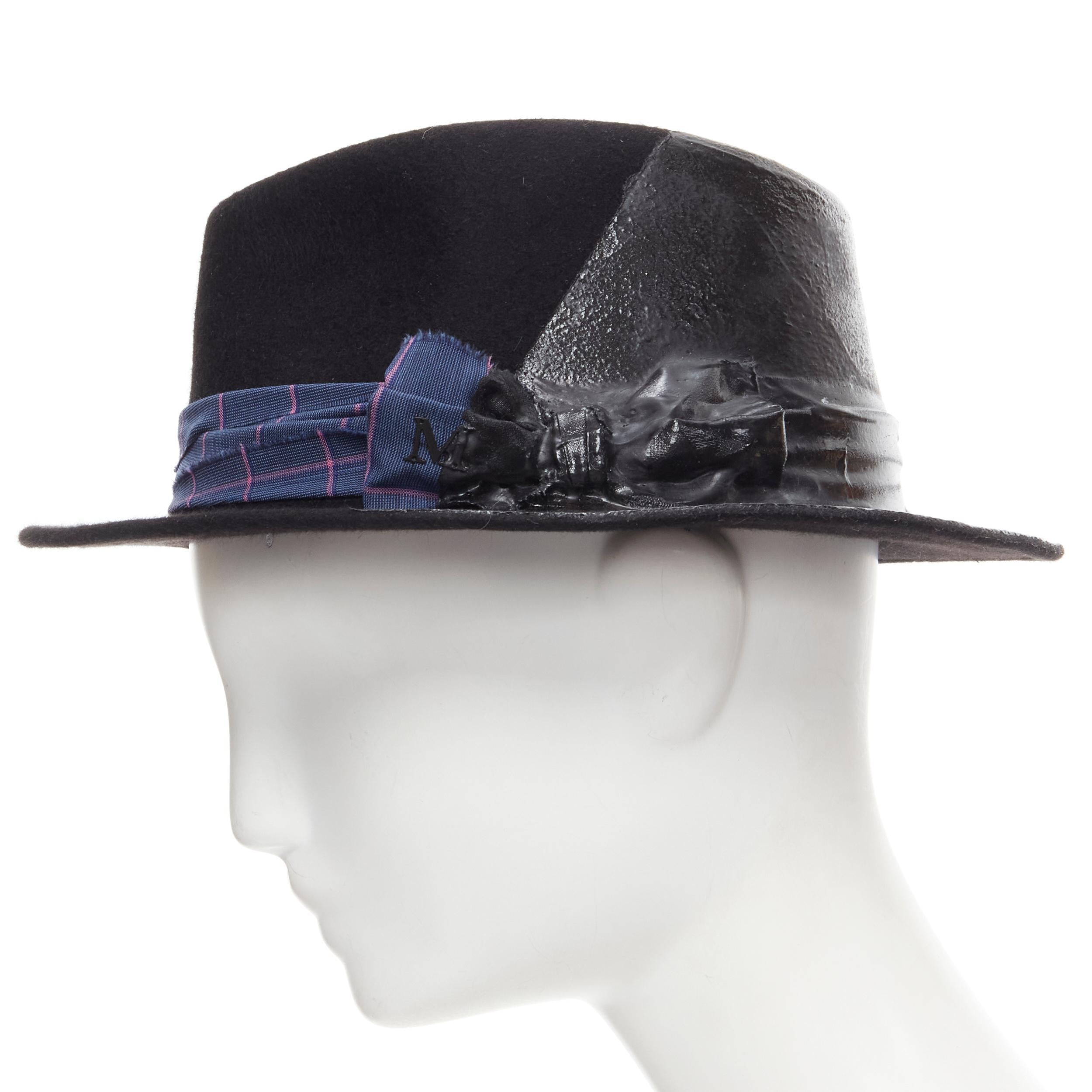 MAISON MICHEL black wool paint lacquered blue check ribbon fedora hat M 57cm 
Reference: MELK/A00159 
Brand: Maison Michel 
Material: Wool 
Color: Black 
Pattern: Solid 
Extra Detail: Fedora hat. Frayed blue purple check wrap ribbon tie bow. Black