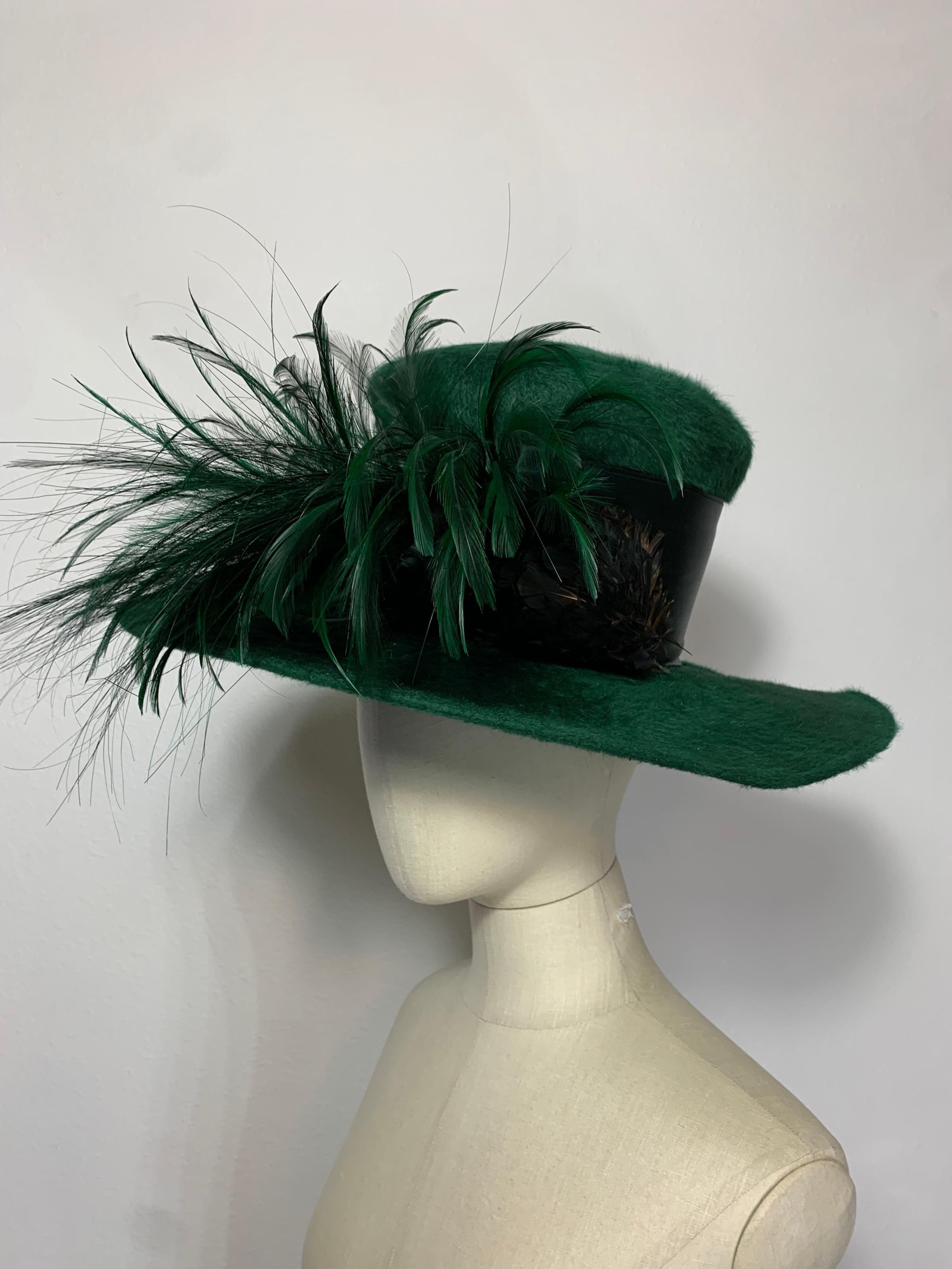 Maison Michel Autumn/Winter Medium Brim Forest Green Fur Felt  Beautifully Blocked High Top Hat with Matching Hackle Feather Pouf and Wide Grosgrain Band: Unlabeled, with attached combs for securing. Size 7 Medium. Made in France. 

Please visit our