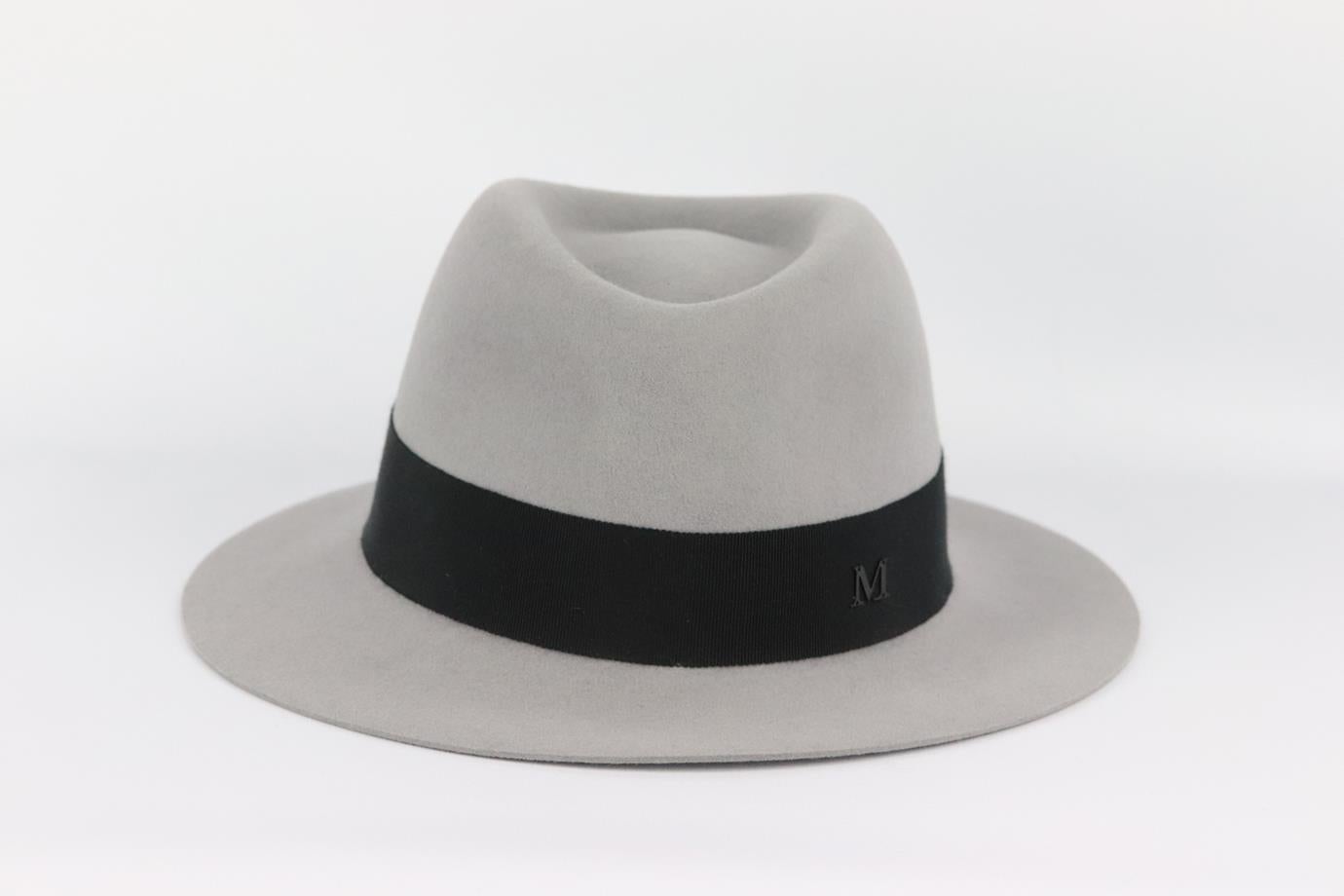 Maison Michel grosgrain trimmed wool felt fedora. Grey and black. Pull on. 100% Wool; trim: 56% cotton, 44% viscose. Does not come with dustbag or box. Size: Large. Circumference: 24.4 in. Brim Width: 2.5 in. Very good condition - No sign of wear;