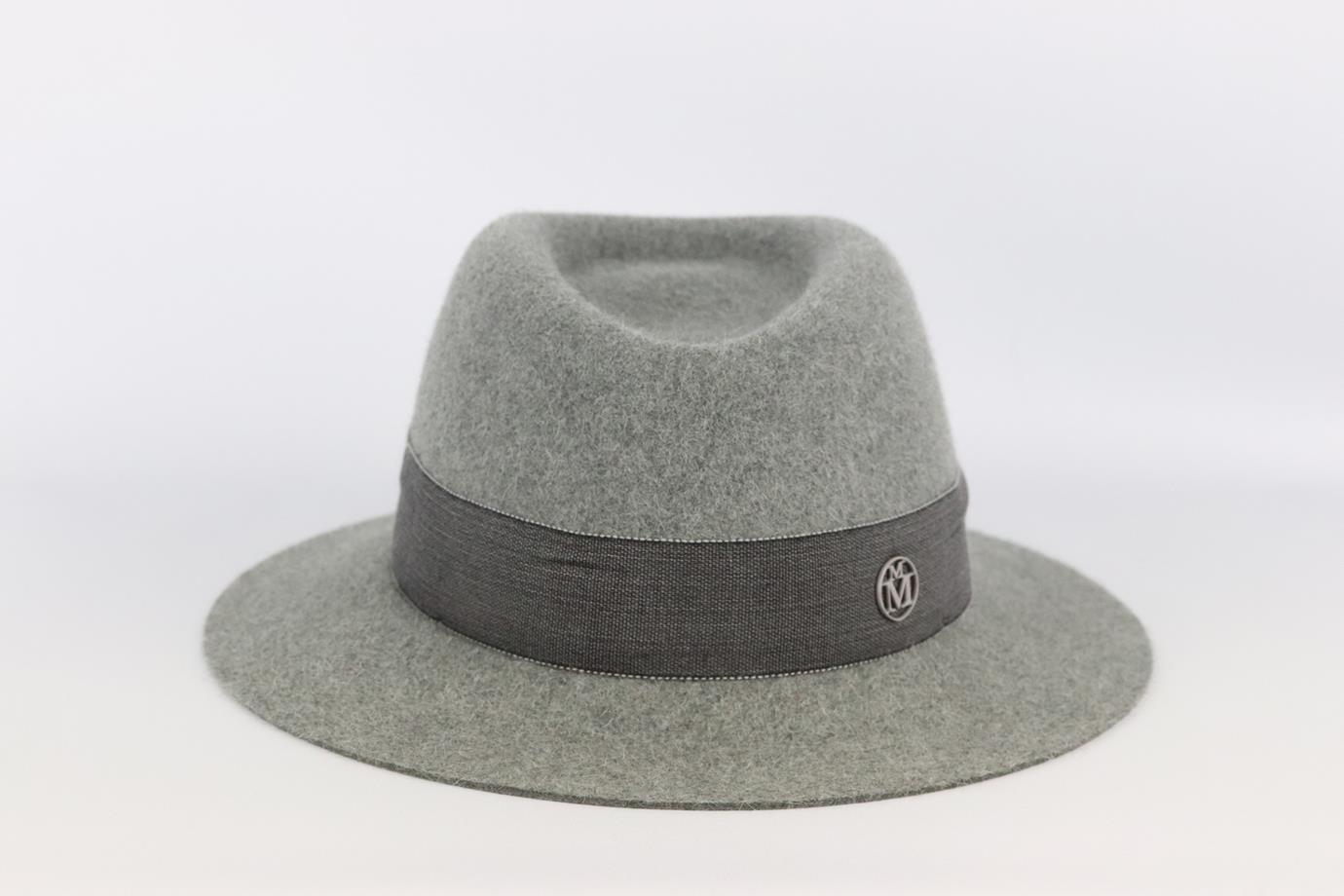 Maison Michel grosgrain trimmed wool felt fedora. Green. Pull on. 100% Wool; trim: 56% cotton, 44% viscose. Does not come with dustbag or box. Size: Medium. Circumference: 23.6 in. Brim Width: 3.25 in. Very good condition - No sign of wear; see