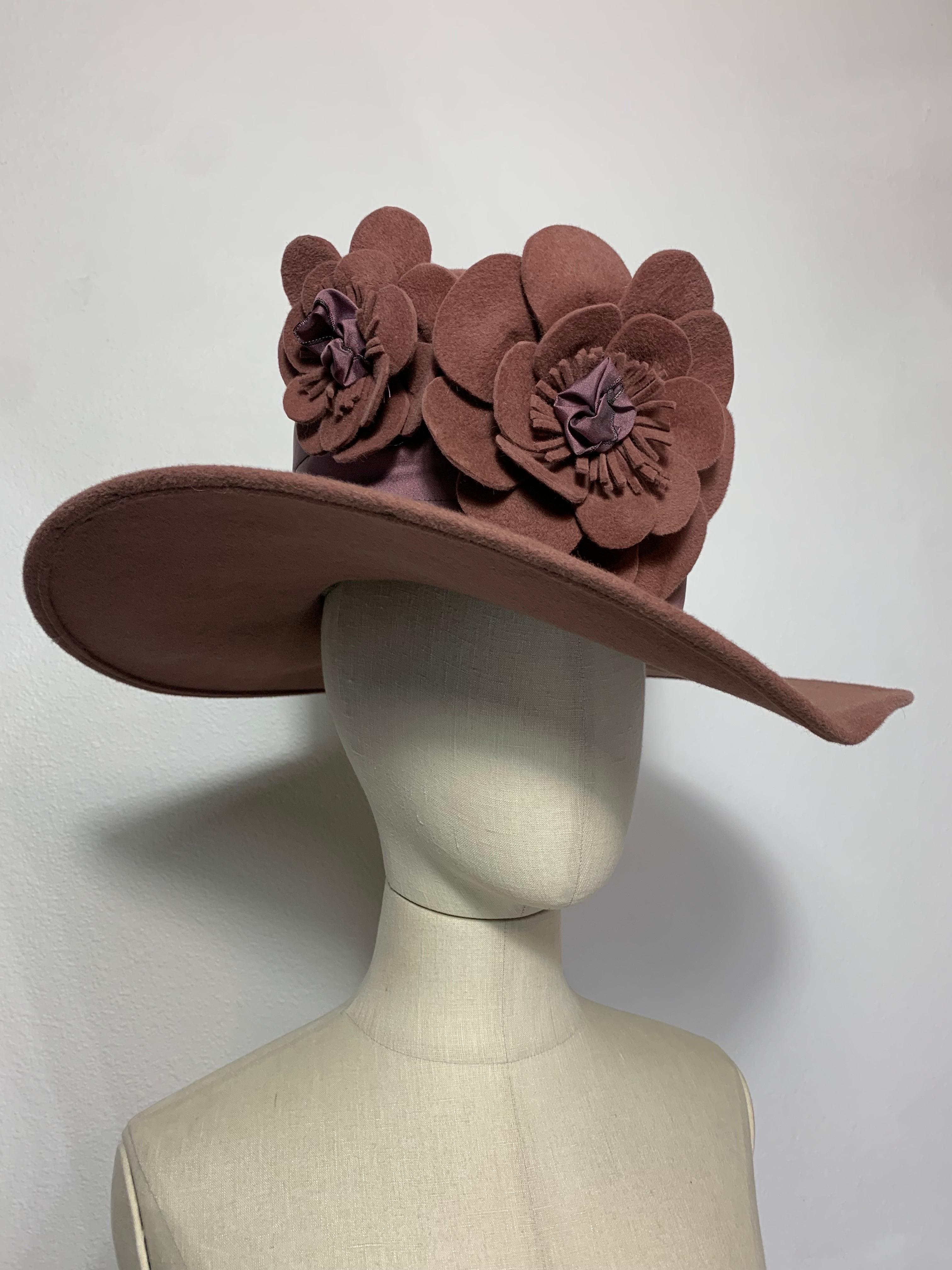 Maison Michel Autumn/Winter Medium Brim Mauve Felt  Beautifully Blocked High Top Hat with Matching Felt and Ribbon Flowers and Wide Pleated Ribbon Band: Unlabeled, with attached combs for securing. Size 7 1/8 Medium. Made in France. 

Please visit