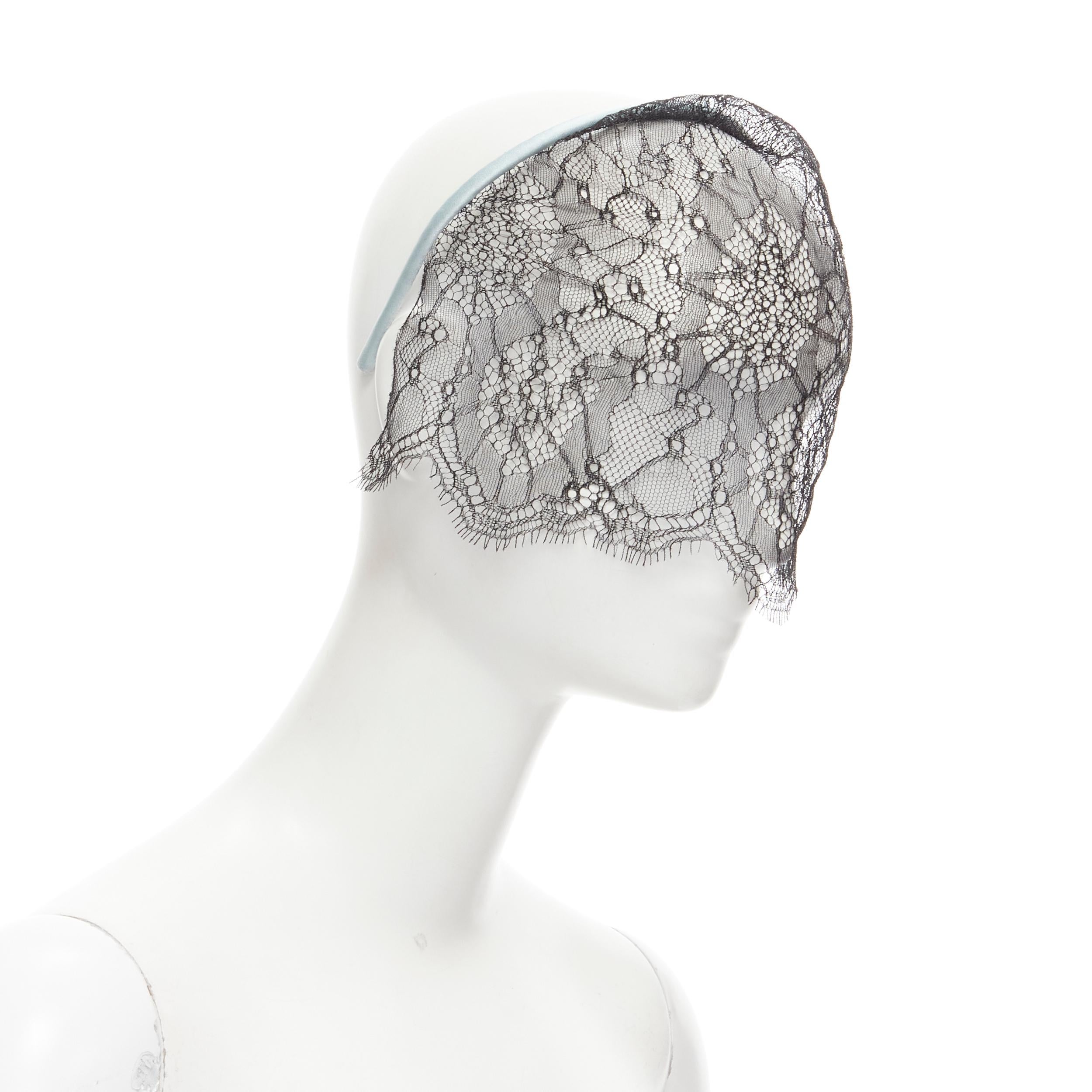 MAISON MICHEL sky blue silk satin black lace veil crystal M logo headband 
Reference: MELK/A00163 
Brand: Maison Michel 
Material: Silk 
Color: Blue 
Pattern: Lace 

CONDITION:
Condition: New without tags. Comes with: One dust bag. 

This Maison