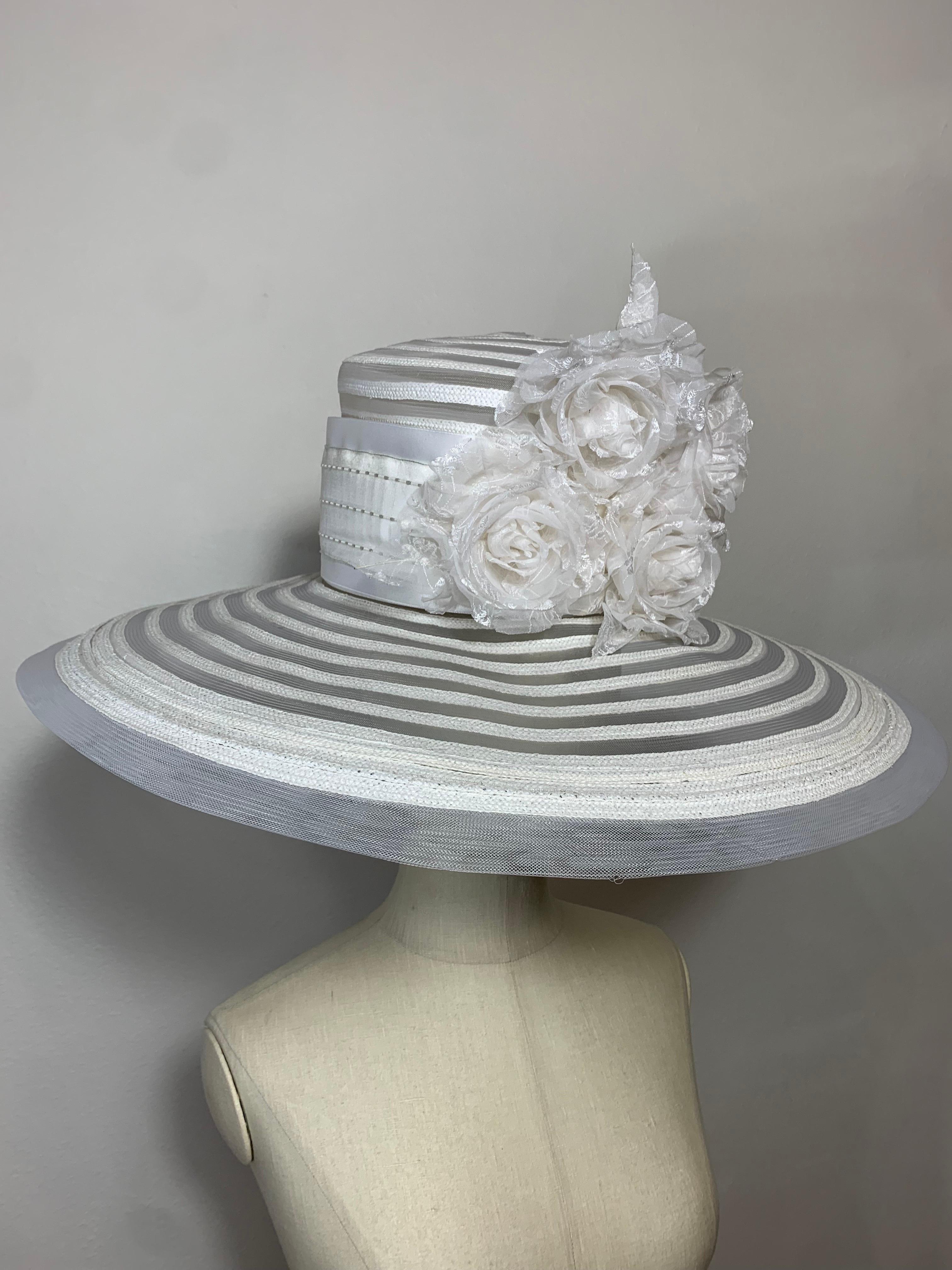 Maison Michel Spring/Summer Sheer White Striped Straw Wide Brim Hat w Florals: Concentric alternating circles of ultra-sheer horsehair and white straw give this extraordinary made-to-order hat a striking look. Very wide 23