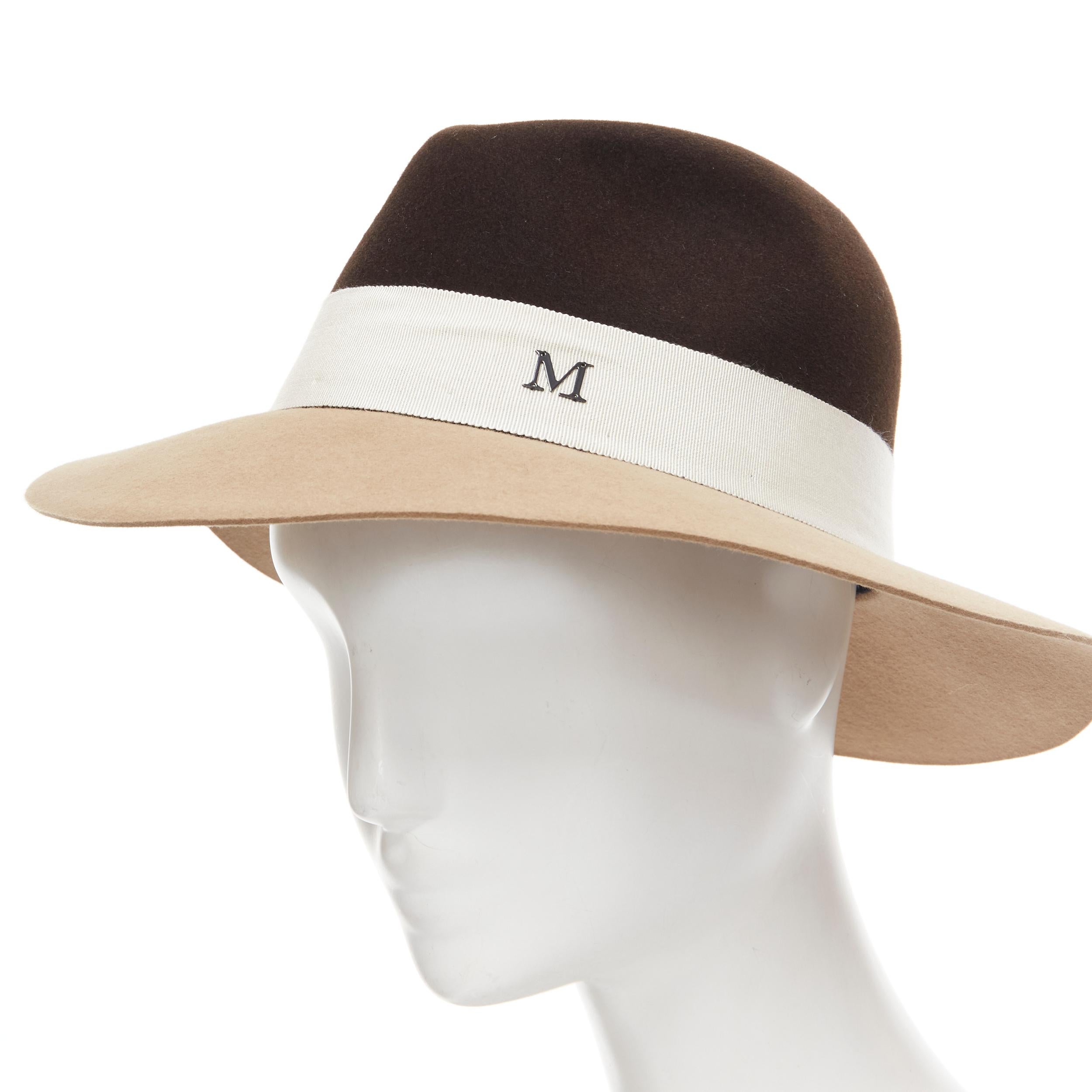 MAISON MICHEL two tone brown camel white grosgrain M logo fedora hat M 57cm 
Reference: MELK/A00158 
Brand: Maison Michel 
Material: Wool 
Color: Brown 
Pattern: Solid 
Closure: Logo 

CONDITION: 
Condition: New without tags. 

SIZING: 
Designer