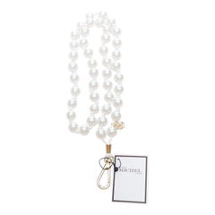 MAISON MICHEL white faux pearl gold M logo lobster bag strap