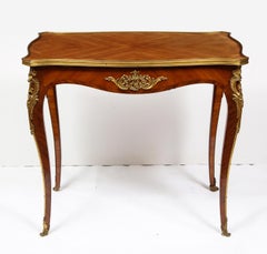 Maison Millet, a Louis XV Style Ormolu-Mounted Parquetry Kingwood Table