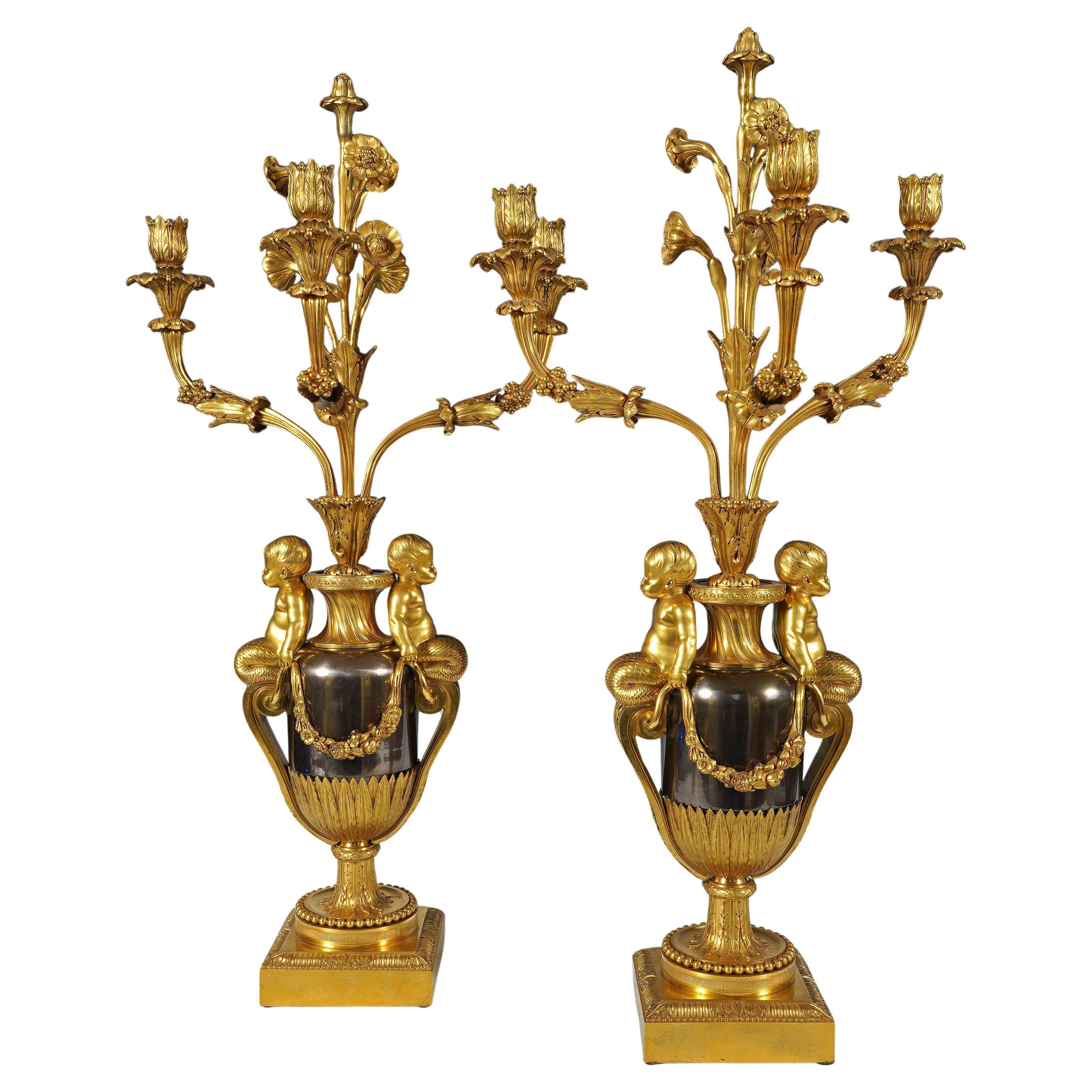 Maison Millet, paire de candélabres Tritons, France, vers 1870