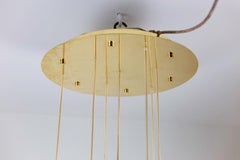 Maison RAAK, Chandelier with 7 Lights in Gilt Brass, 1970s