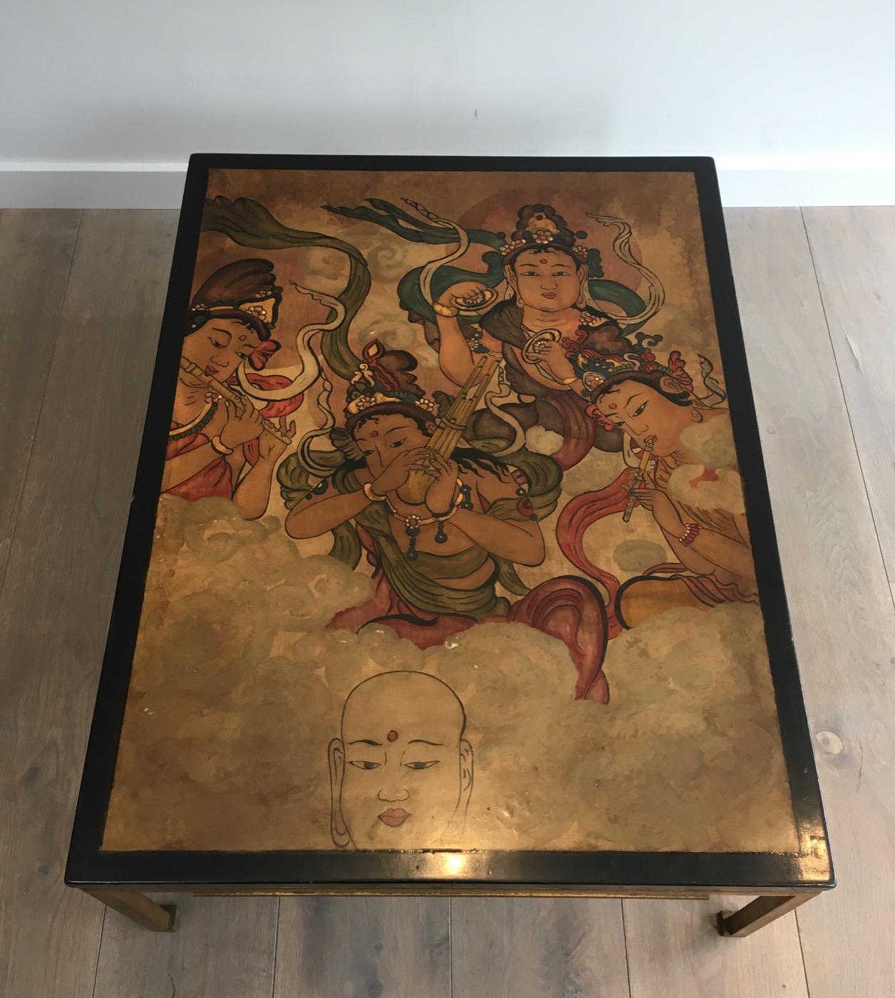 Maison Ramsay. Special order. Amazing Unique coffee table with lacquered top representing Tibetans. Gold gilt steel base. Very nice and fine quality. French, circa 1940.