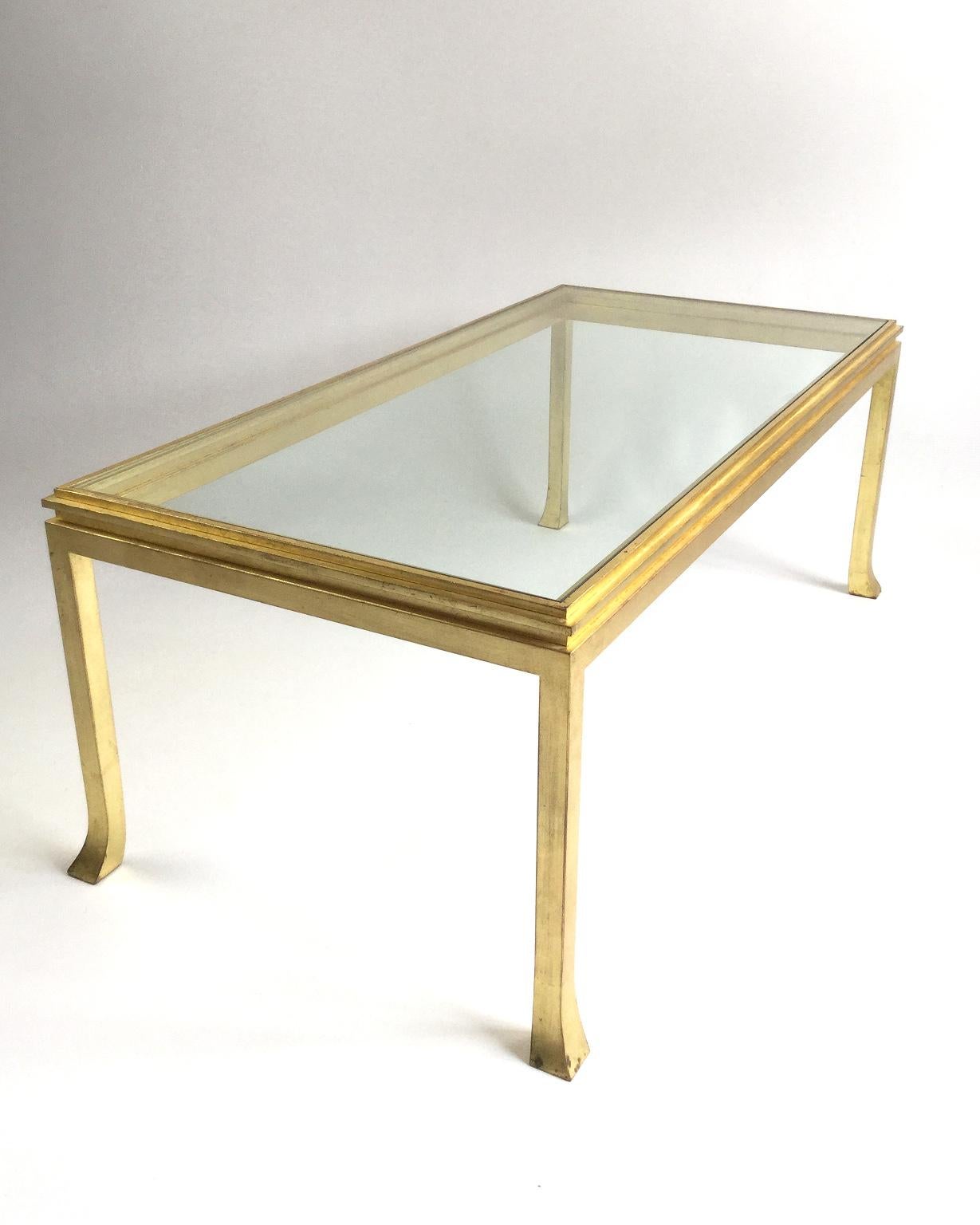 Gilded rectangular coffee table, iconic design by Henri Pouenat for Maison Ramsay 
With its own original clear glass stamped by St Gobain.
 