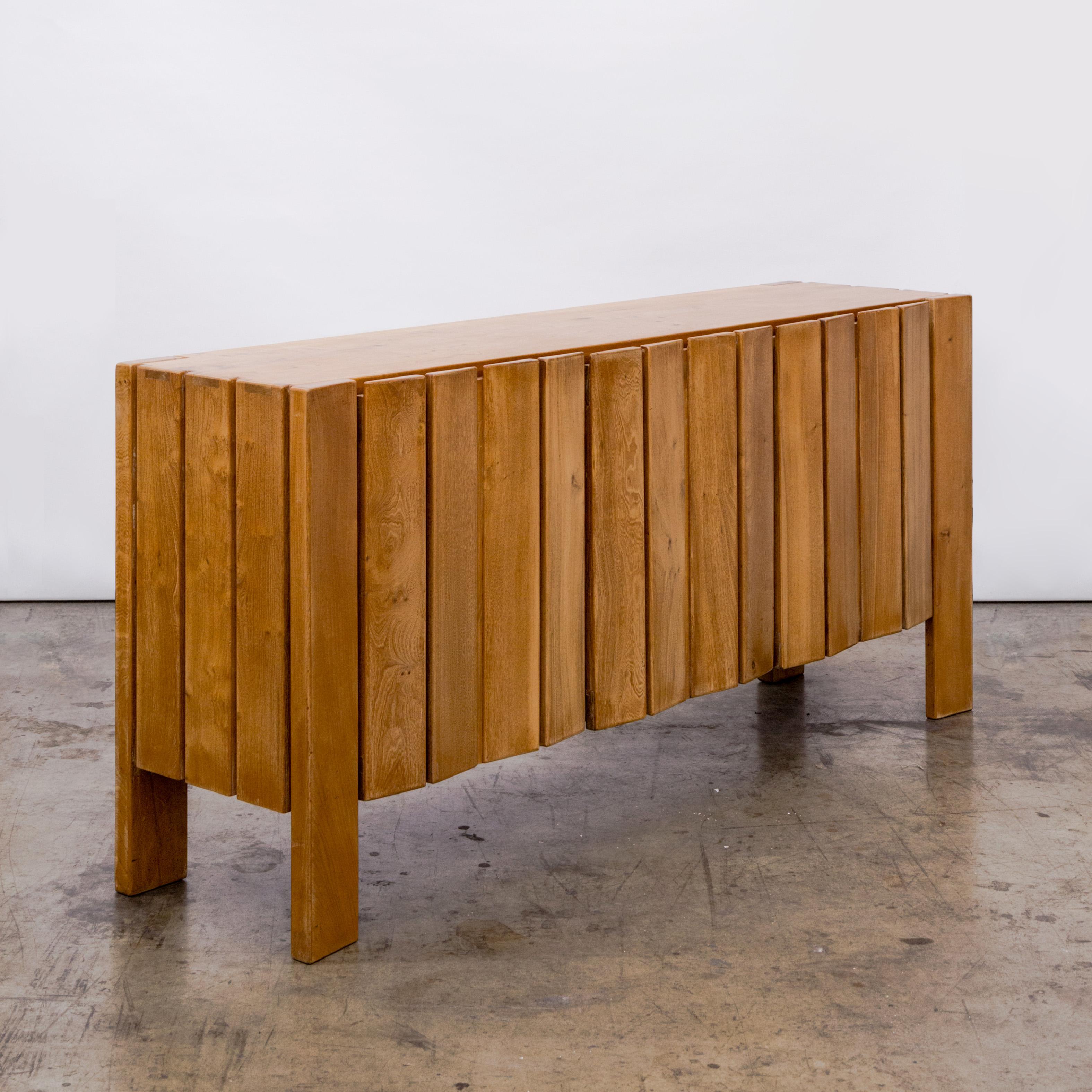 Brutalist solid elm wood credenza with planked door fronts by Maison Regain, France circa 1970's. 