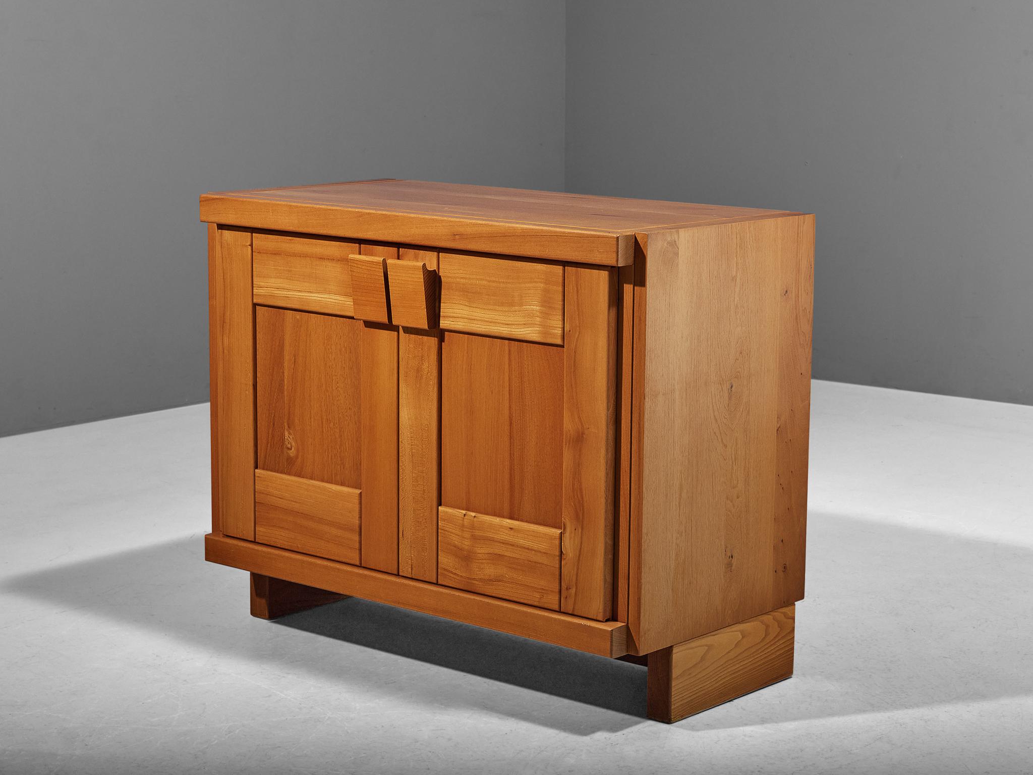Cabinet, elm, France, 1970s

Stunning French cabinet executed in elm, designed by Maison Regain. The sideboard is sturdy and combines a simplified yet complex design with nifty, solid construction details that characterize Maison Regain's designs.