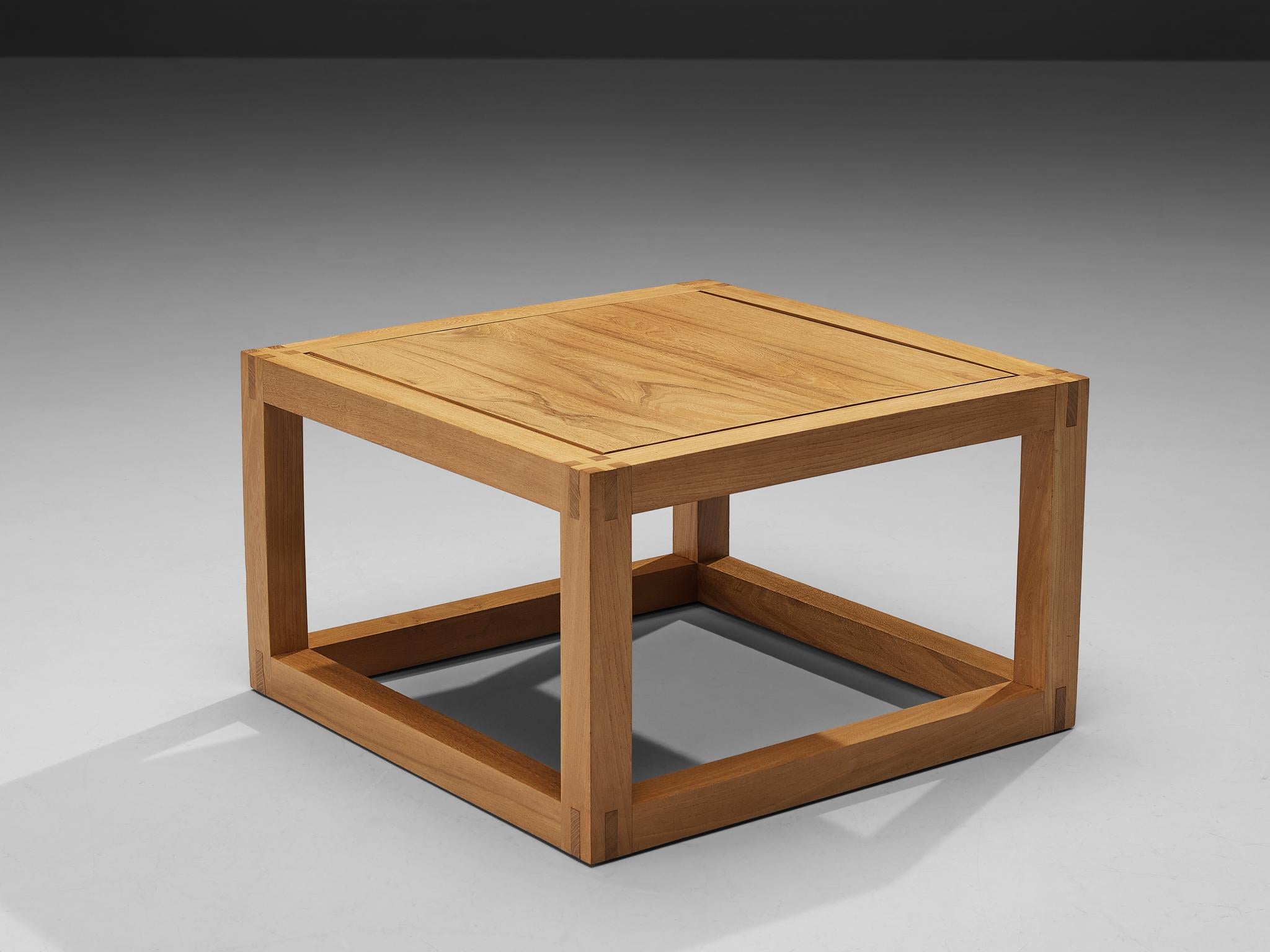 Maison Regain, side table, solid elm, France, 1970s

Side coffee table with admirable wood joints by French manufacturer Maison Regain. A square builds the main theme and repetitive form of this side table. The squared top rests in a frame of the