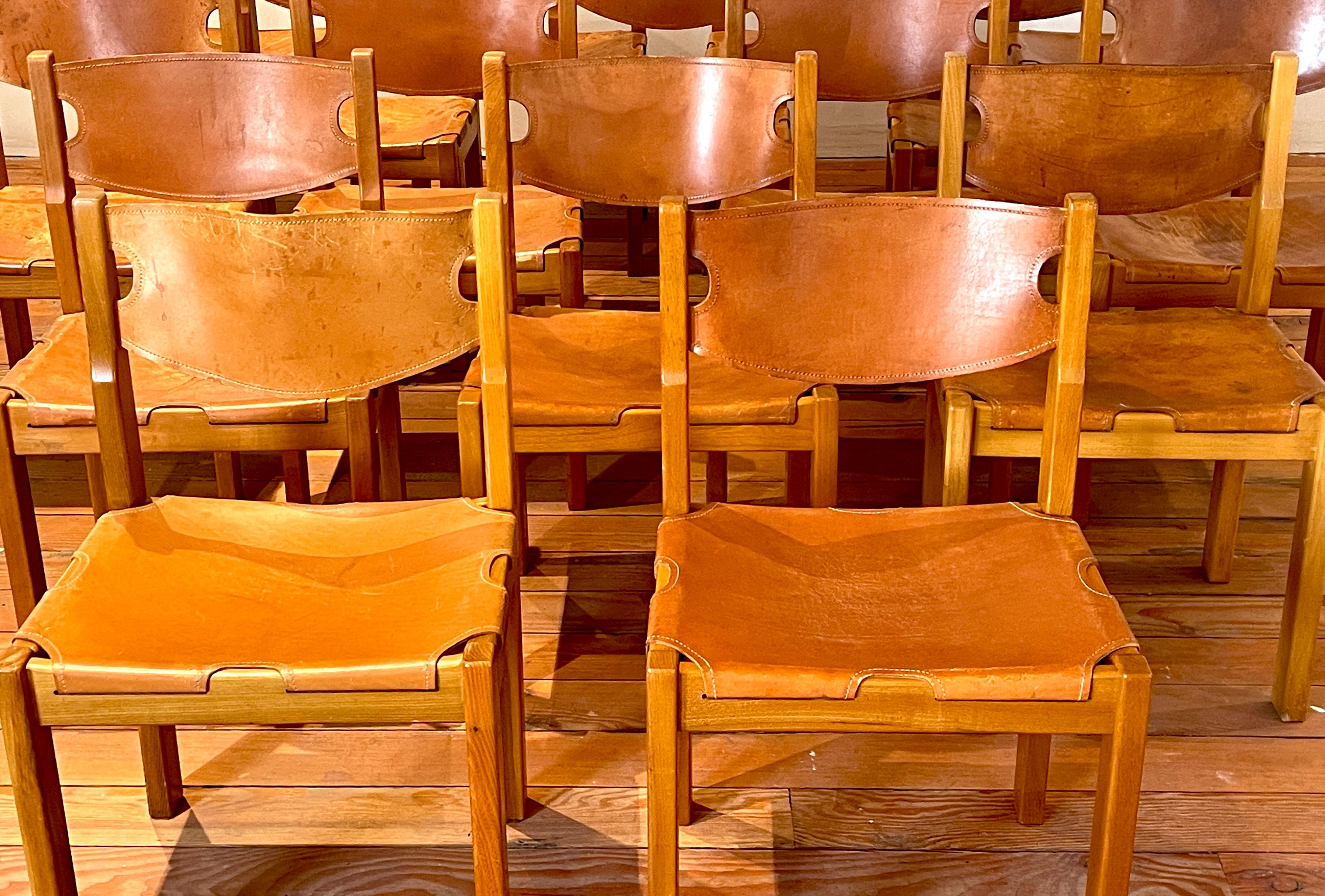 Maison Regain leather and elm wood chairs.
Reminiscent of Pierre Chapo with great construction and simple design. 
Priced individually.
 