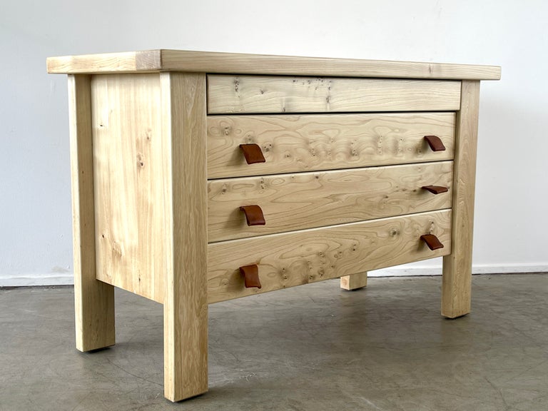 Maison Regain chest of drawers with solid elm construction in the style of Pierre Chapo - with leather pulls.
Wonderful craftsmanship with natural raw elm wood. 
