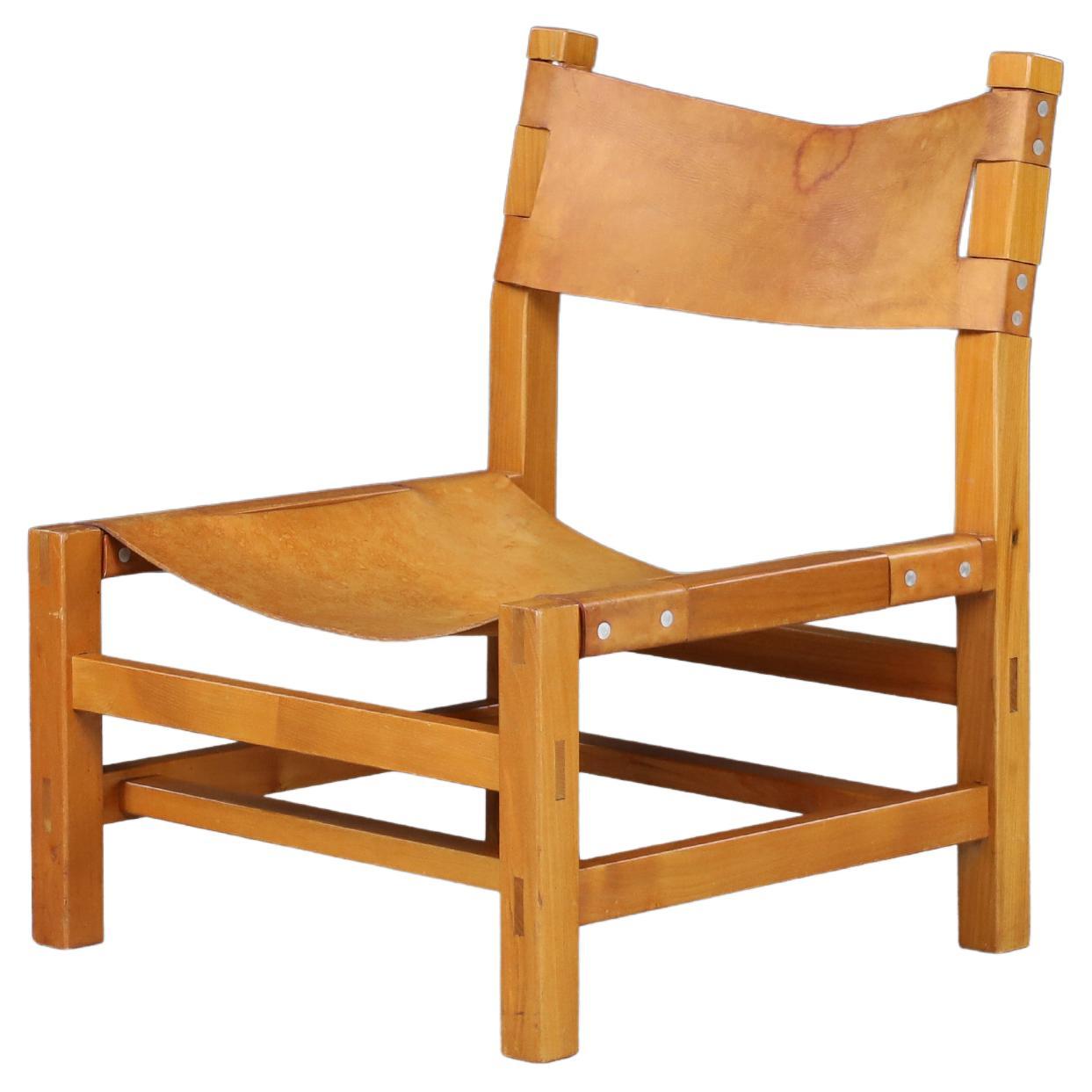 Maison Regain Easy Chair in Solid Elm and Patinated Cognac Leather, France 1960s