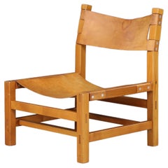 Maison Regain Easy Chair in Solid Elm and Patinated Cognac Leather, France 1960s